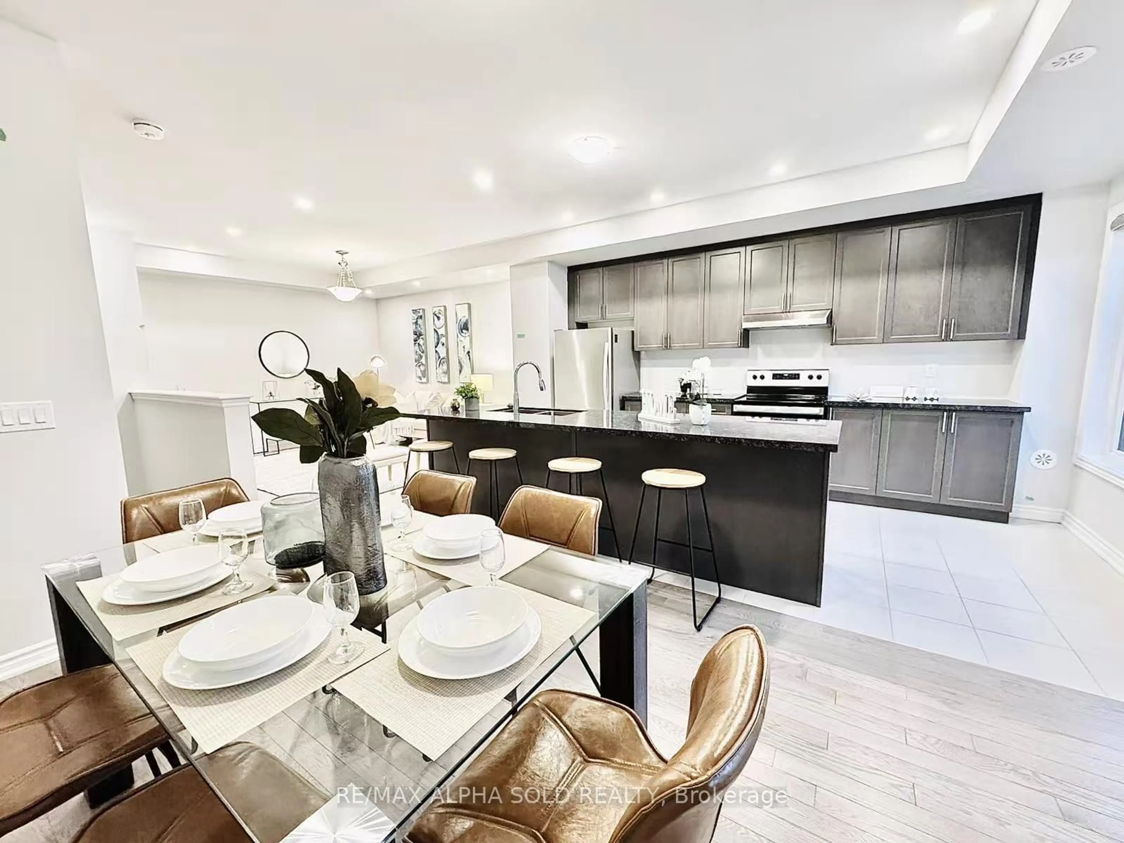 Open concept kitchen, ceramic/tile floor for 40 Herman Gilroy Lane, Markham Ontario L6C 3L7