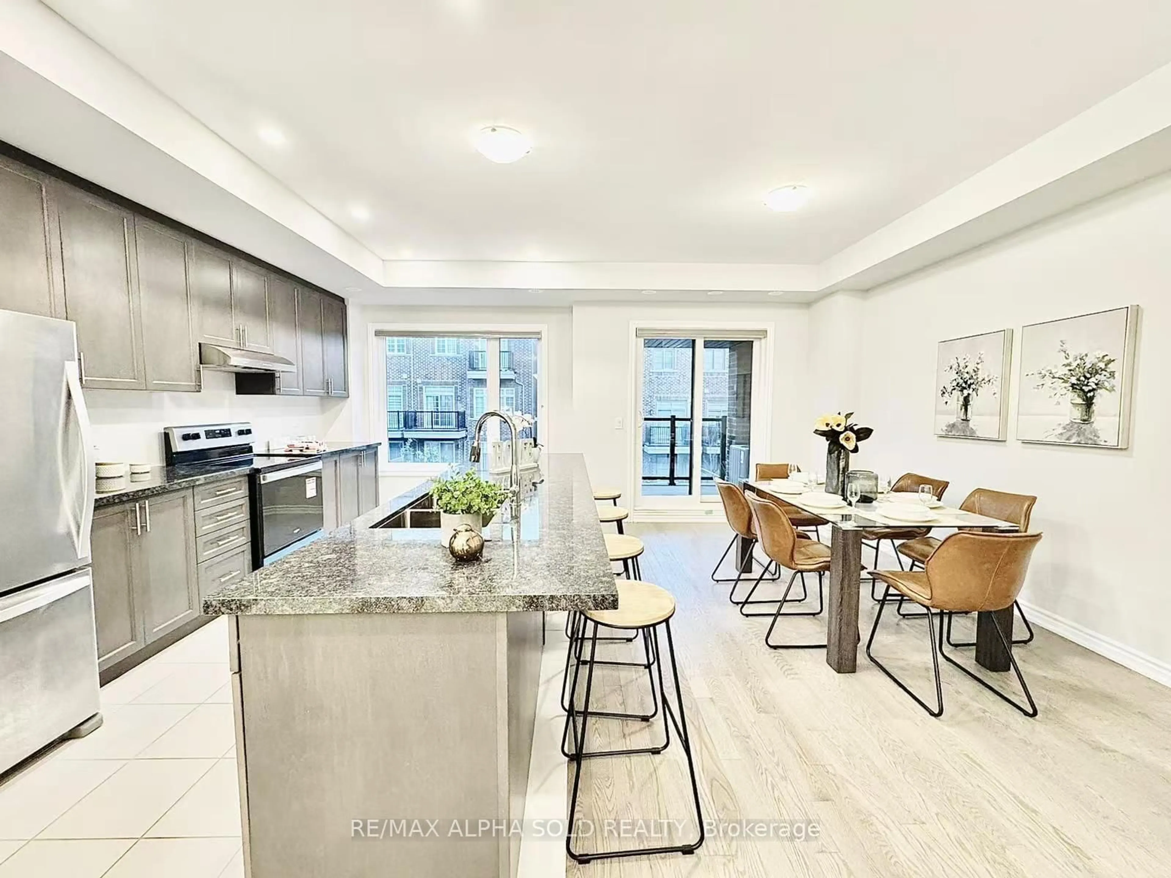 Open concept kitchen, ceramic/tile floor for 40 Herman Gilroy Lane, Markham Ontario L6C 3L7