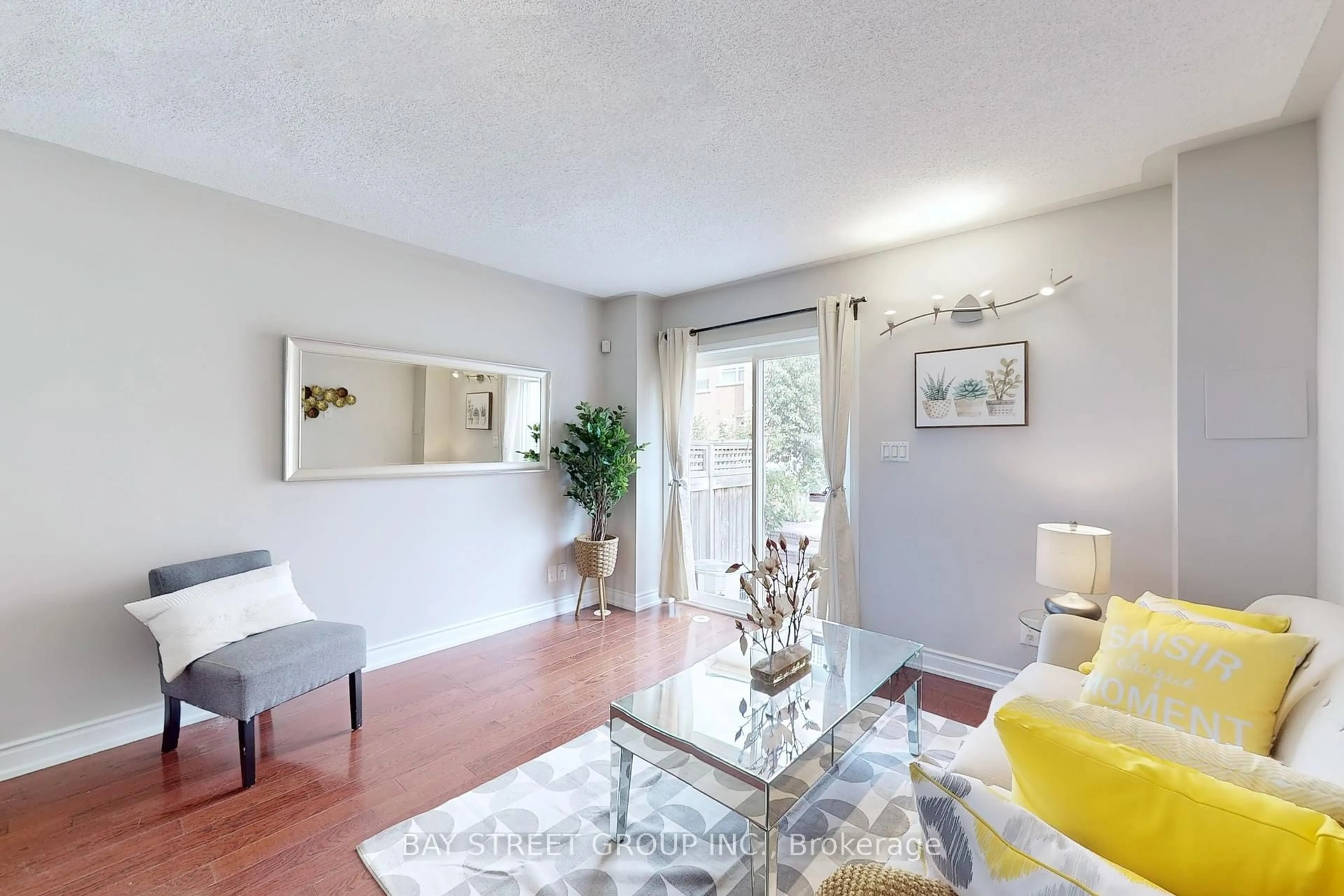 Living room with furniture, wood/laminate floor for 20 Faithful Way, Markham Ontario L3R 1A1