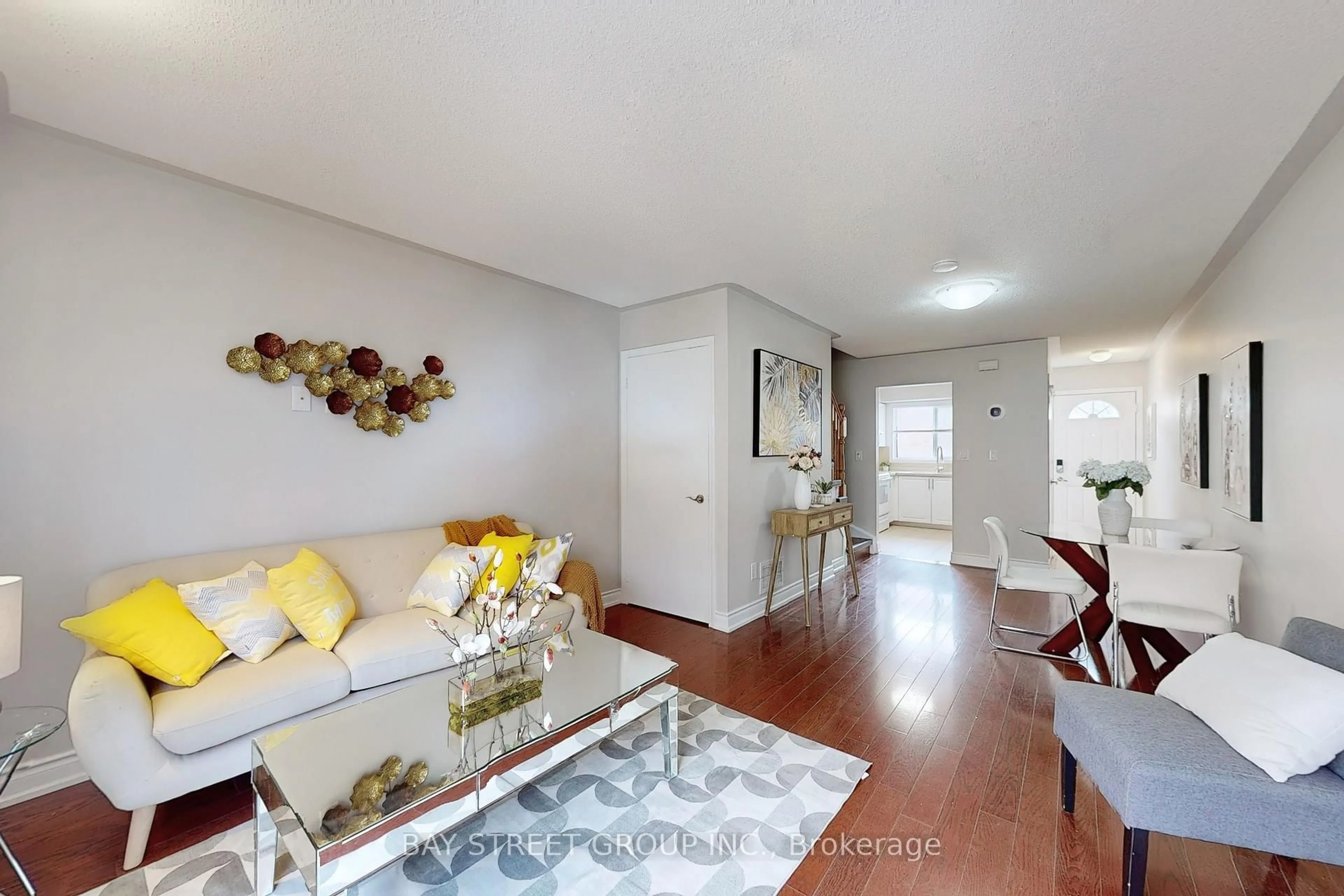 Living room with furniture, wood/laminate floor for 20 Faithful Way, Markham Ontario L3R 1A1
