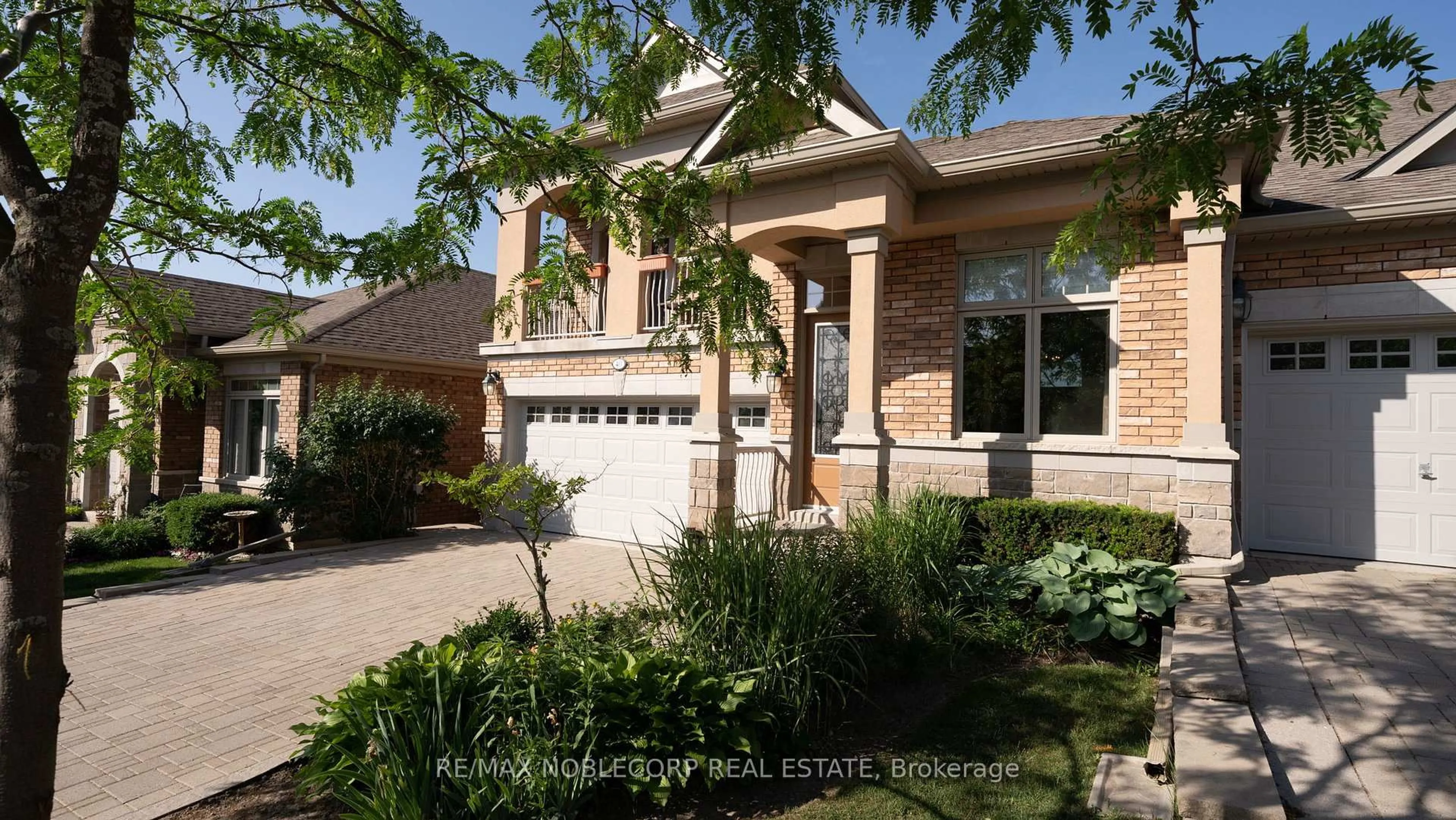Home with brick exterior material, street for 40 Hillcrest Dr #128, New Tecumseth Ontario L9R 0N4