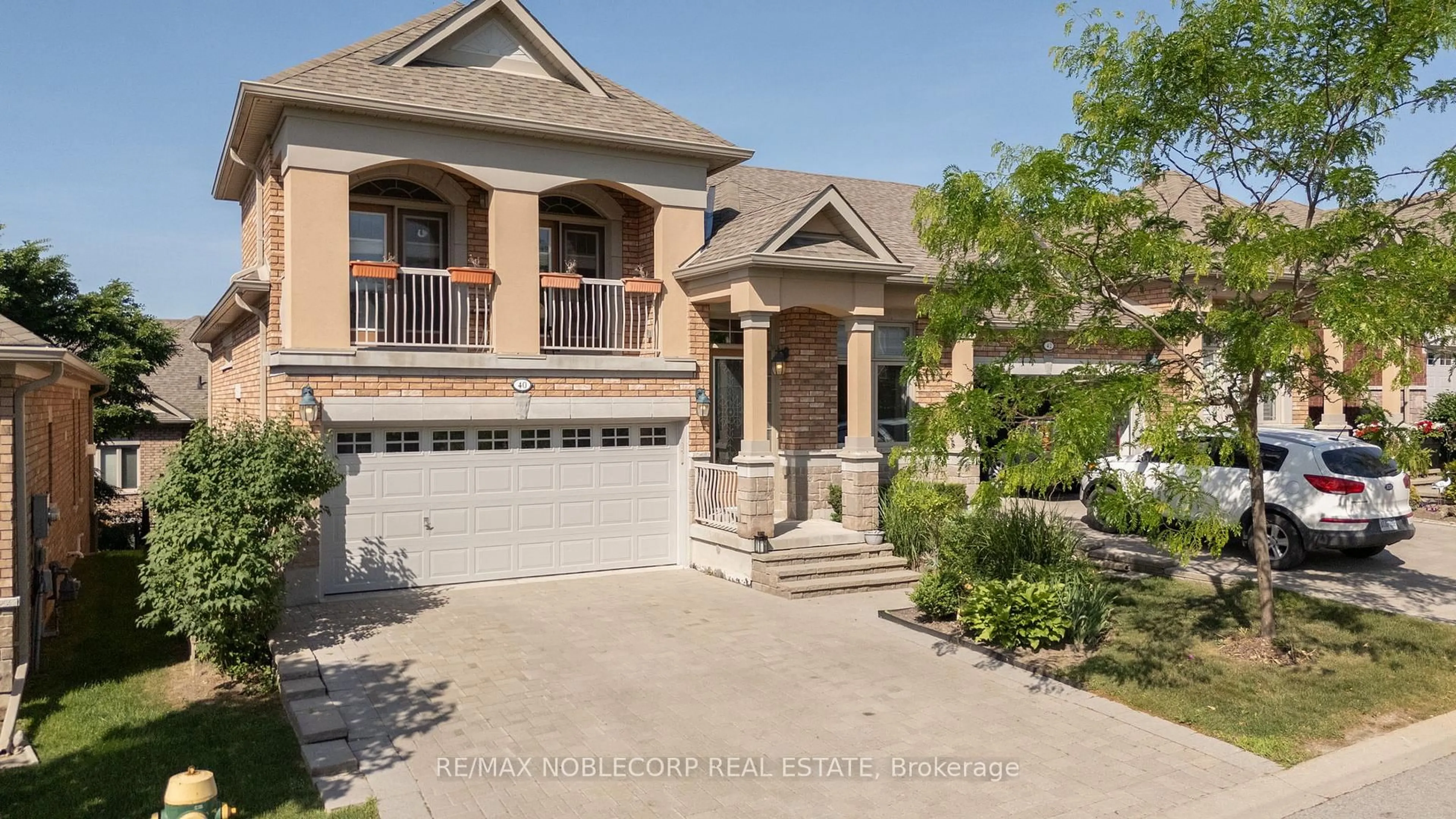 Home with brick exterior material, street for 40 Hillcrest Dr #128, New Tecumseth Ontario L9R 0N4