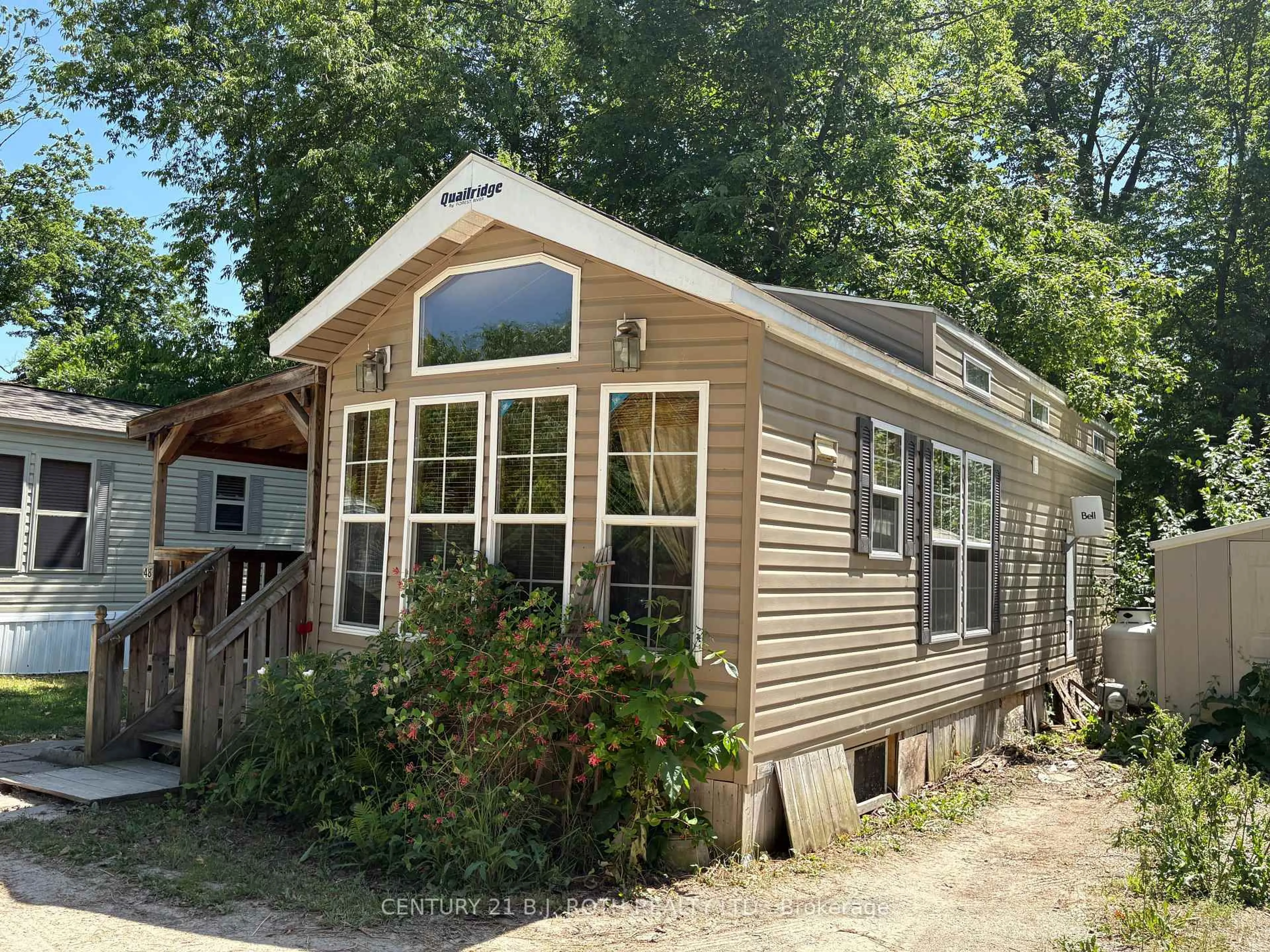 Home with vinyl exterior material, street for 6047 89 Highway #48, New Tecumseth Ontario L9R 1V4