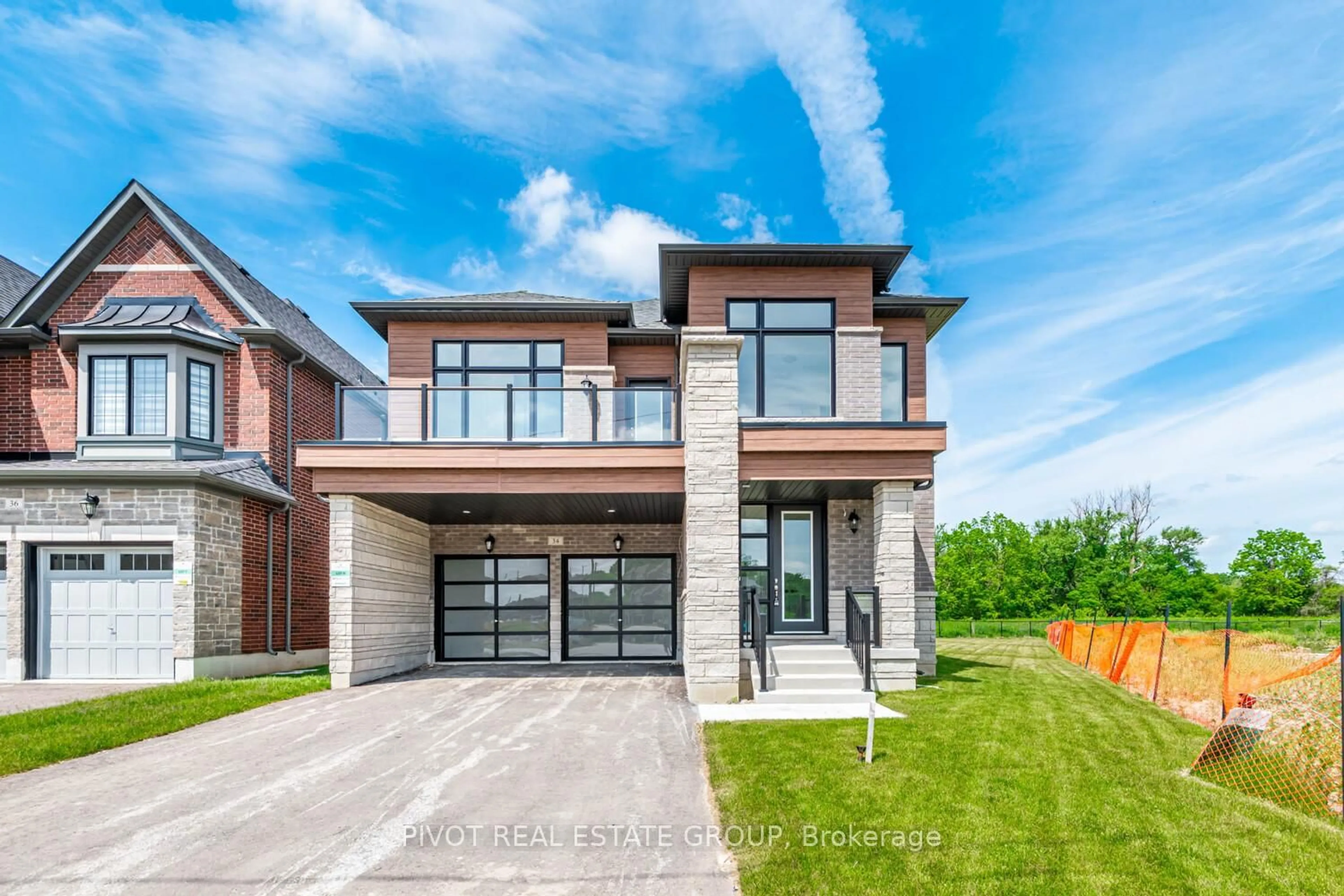 Home with brick exterior material, street for 34 Montorio Dr, Richmond Hill Ontario L4E 1N4