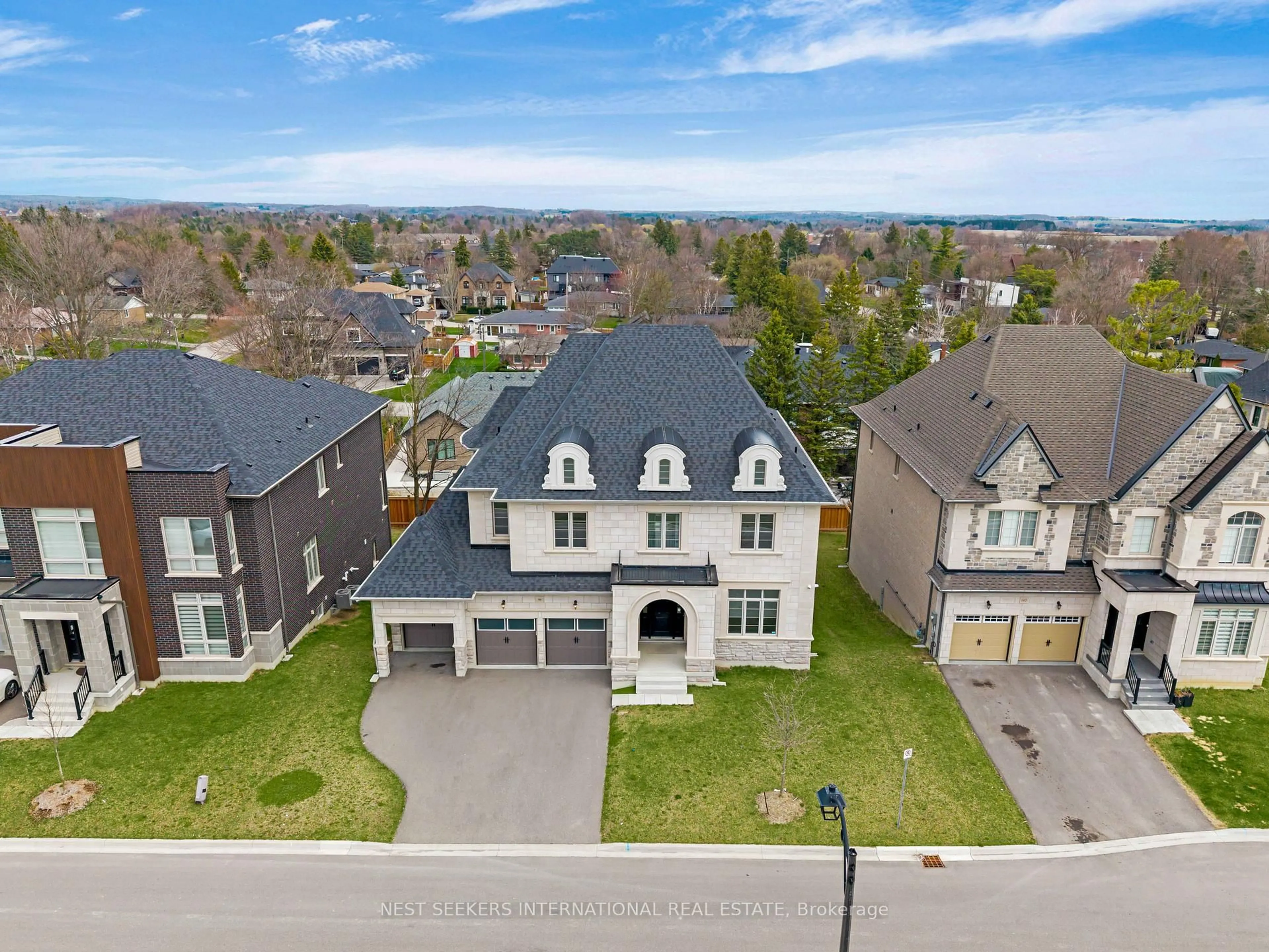 A pic from outside/outdoor area/front of a property/back of a property/a pic from drone, street for 96 Stokes Dr, King Ontario L7B 0P8