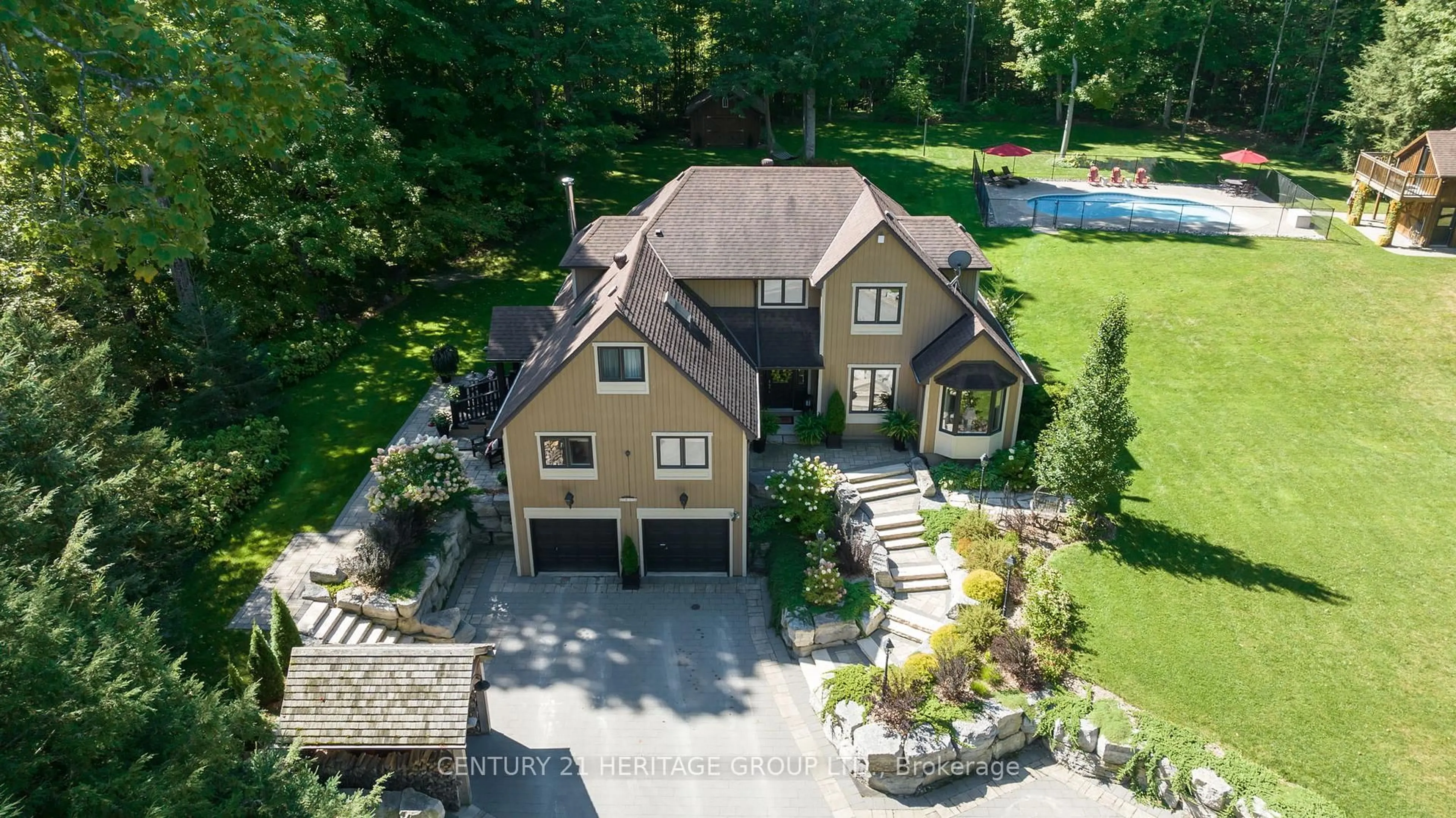 A pic from outside/outdoor area/front of a property/back of a property/a pic from drone, street for 7812 4th Line, Essa Ontario L3W 0S5