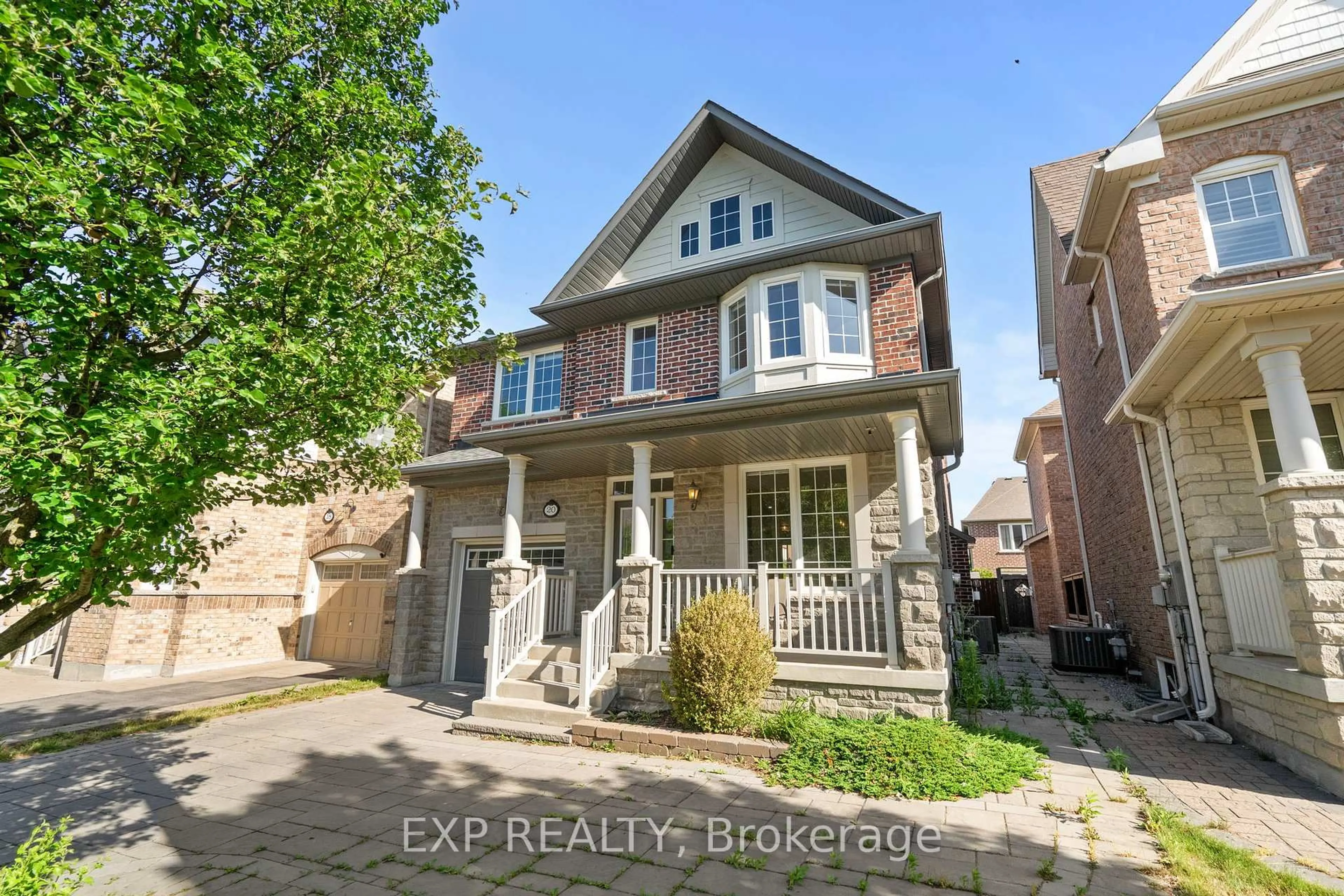 Home with brick exterior material, street for 20 James Joyce Dr, Markham Ontario L6C 0L7