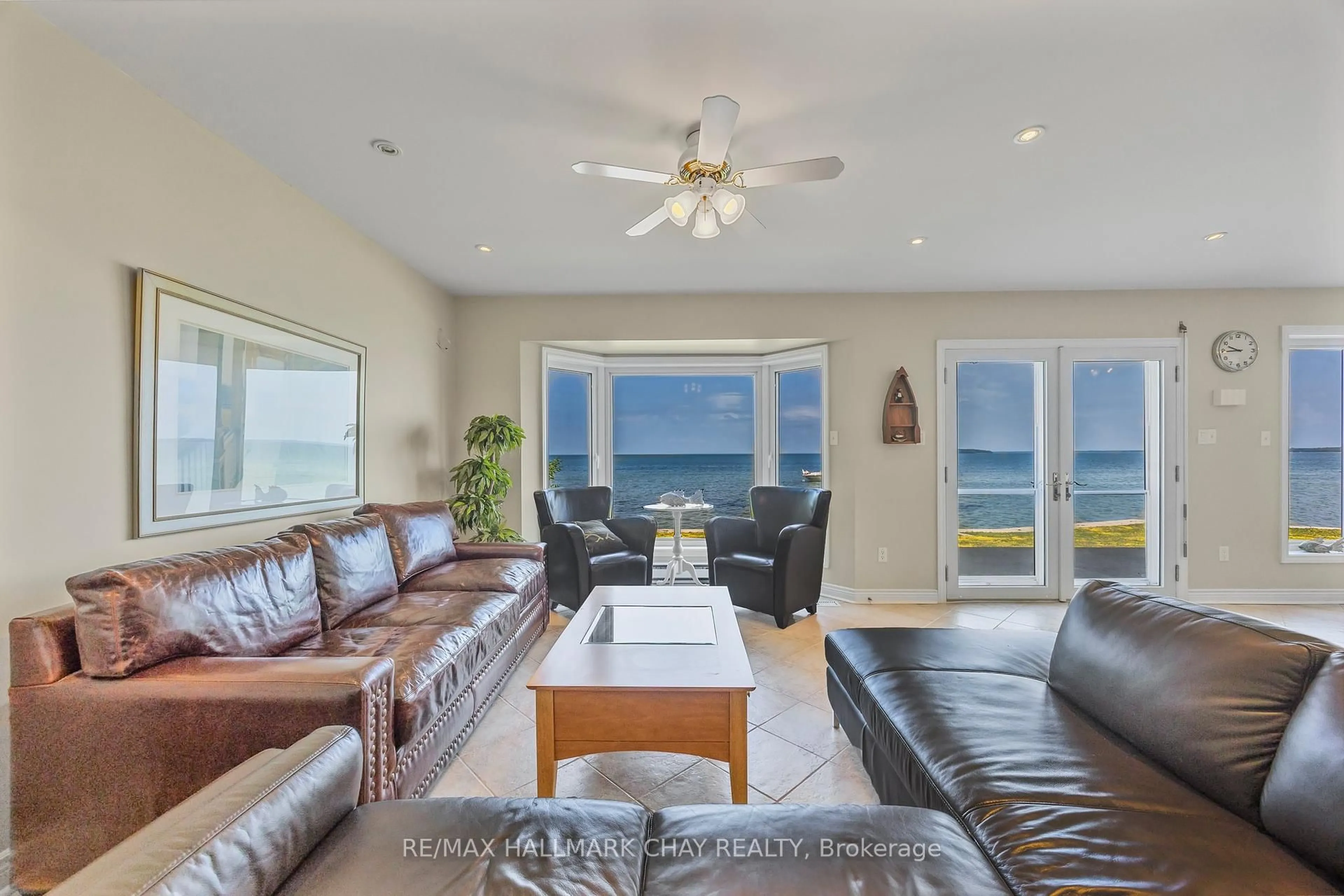 Living room with furniture, ceramic/tile floor for 2653 Leonard St, Innisfil Ontario L9S 3V3