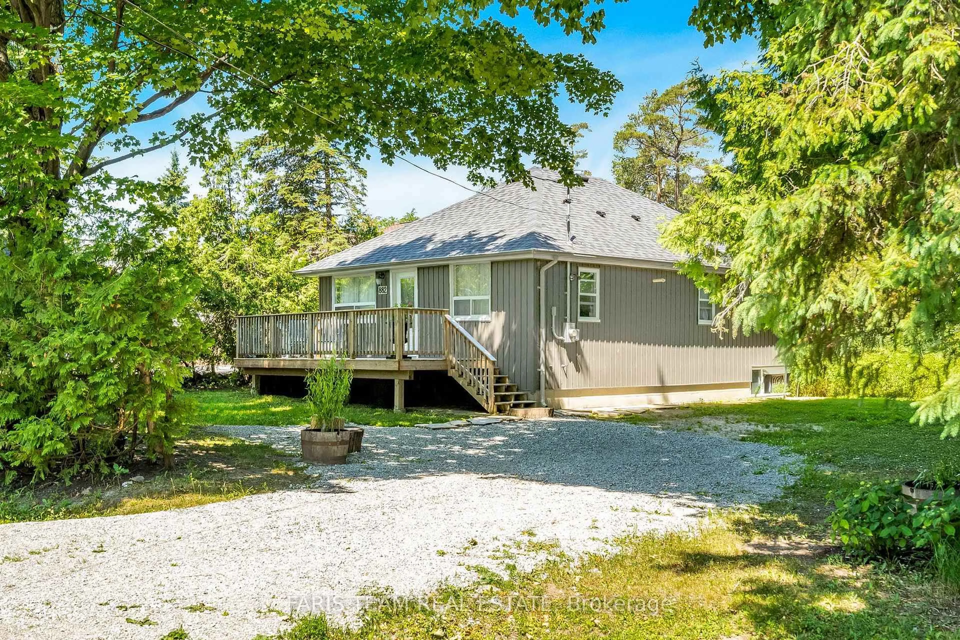A pic from outside/outdoor area/front of a property/back of a property/a pic from drone, water/lake/river/ocean view for 882 Kennedy Rd, Innisfil Ontario L9S 4M5