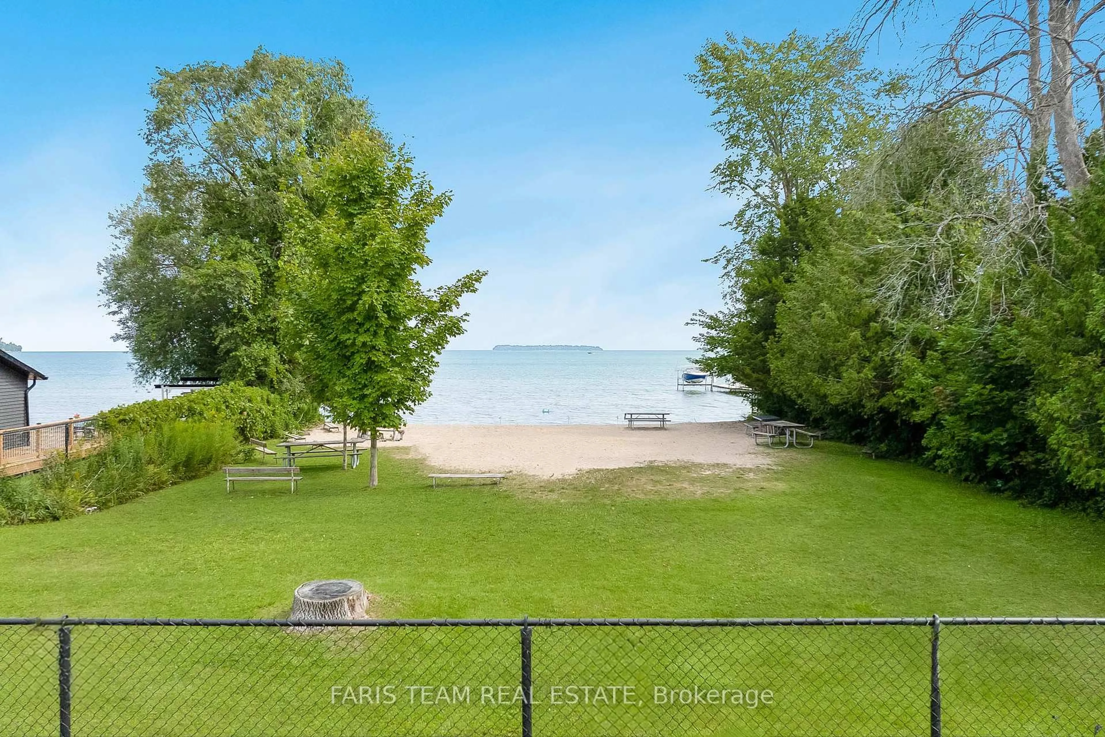 A pic from outside/outdoor area/front of a property/back of a property/a pic from drone, water/lake/river/ocean view for 882 Kennedy Rd, Innisfil Ontario L9S 4M5