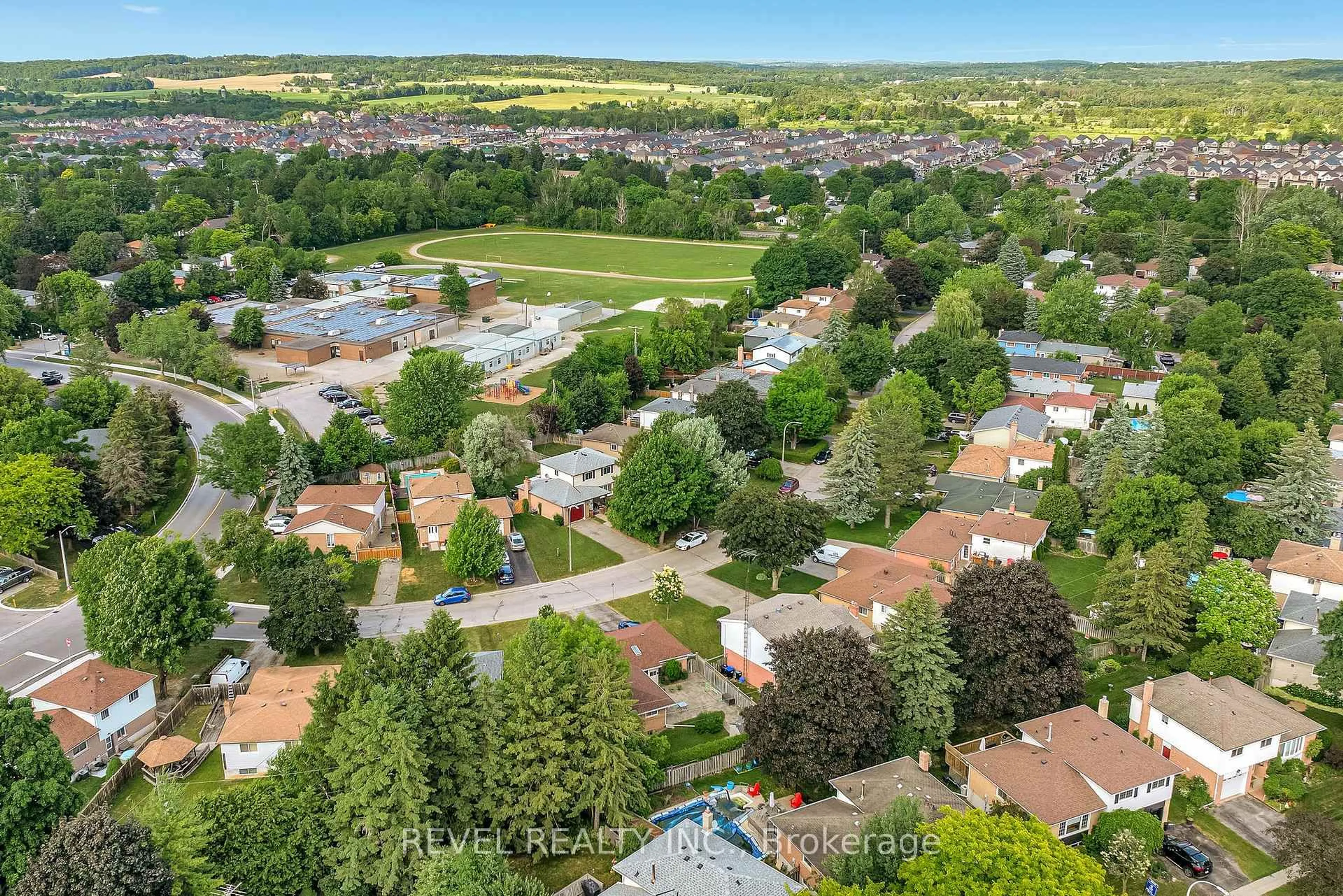 A pic from outside/outdoor area/front of a property/back of a property/a pic from drone, unknown for 21 Adeline Ave, New Tecumseth Ontario L0G 1W0
