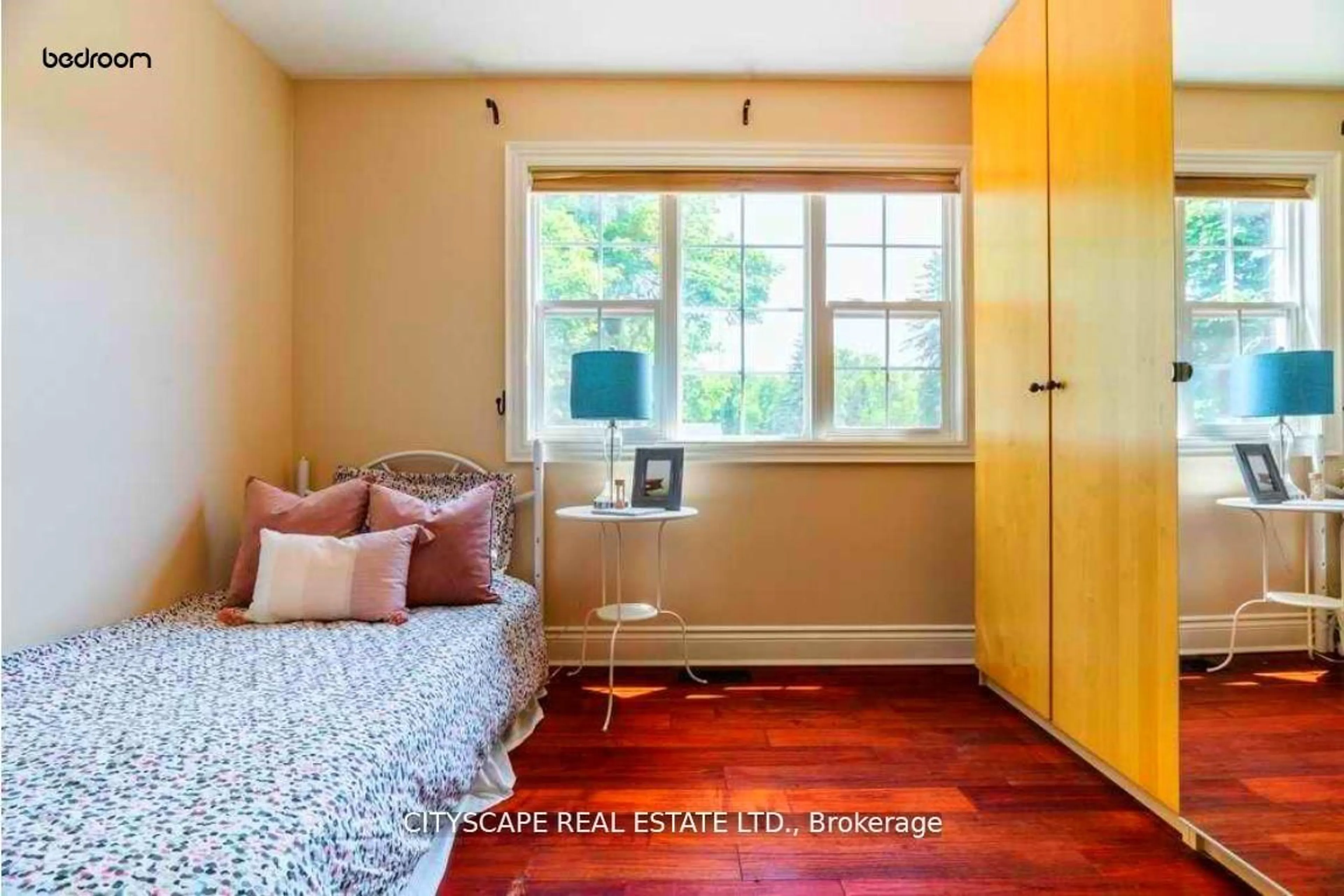Bedroom with bed, wood/laminate floor for 10300 Ravenshoe Rd, Georgina Ontario L0C 1L0