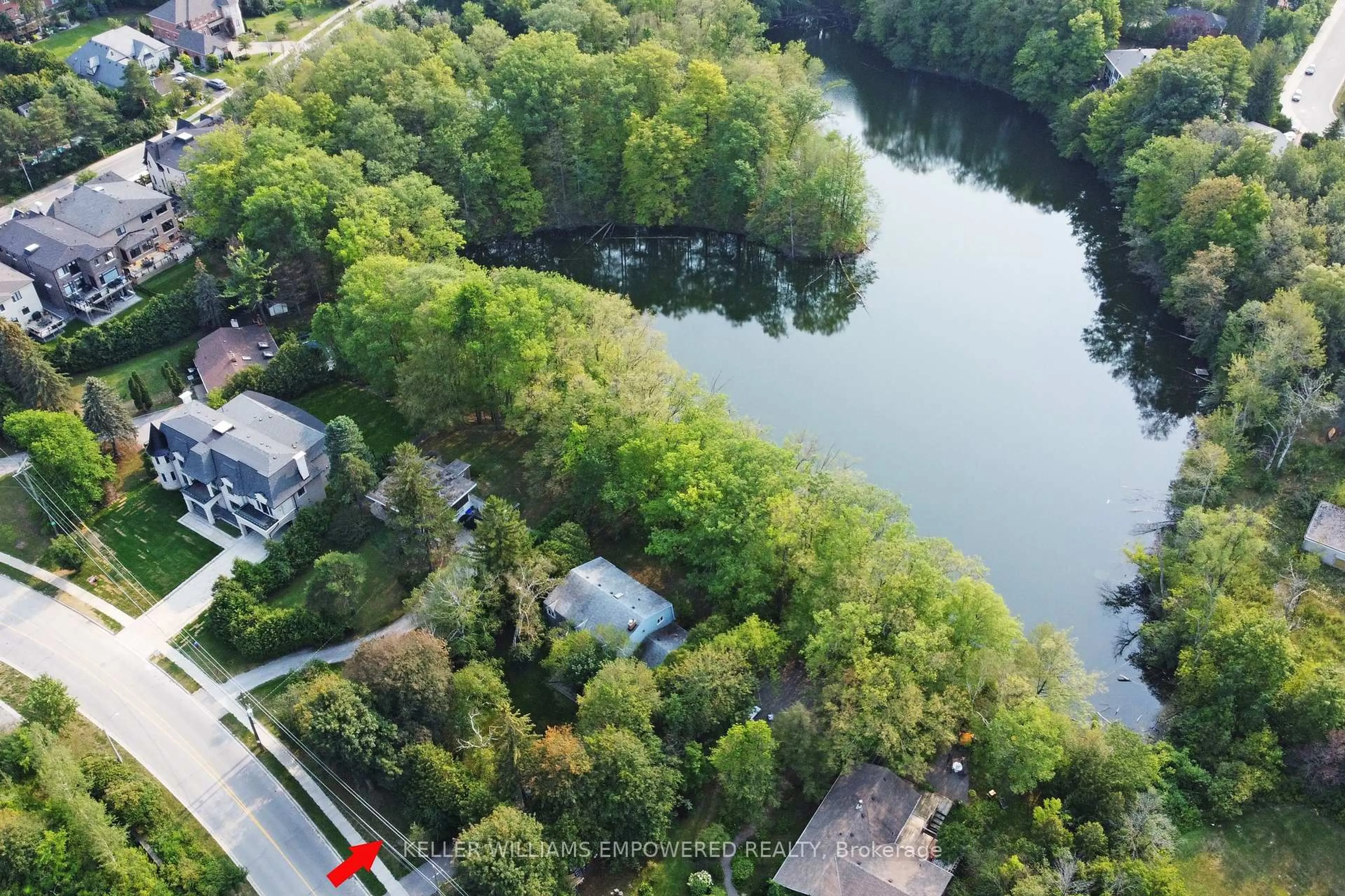 A pic from outside/outdoor area/front of a property/back of a property/a pic from drone, water/lake/river/ocean view for 16 Bayview Park Lane, Richmond Hill Ontario L4E 4K7