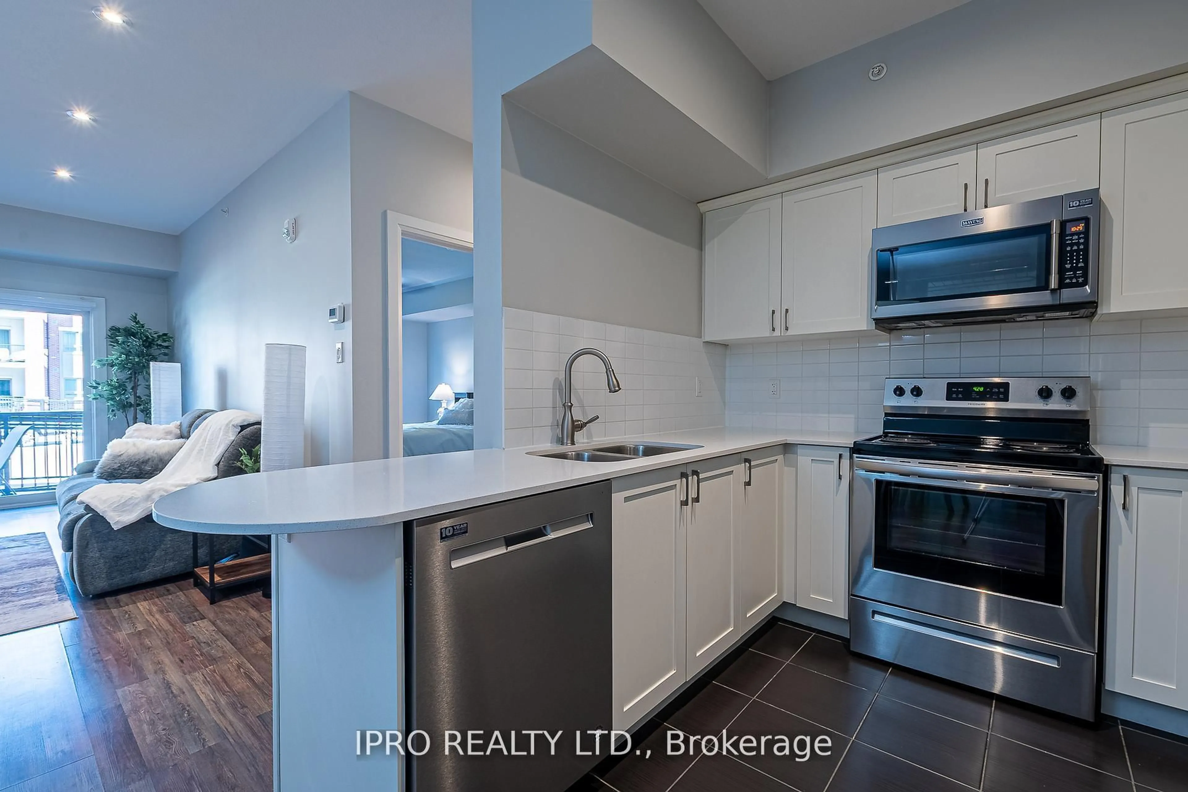Open concept kitchen, unknown for 161 Wellington St #107, New Tecumseth Ontario L9R 0R8