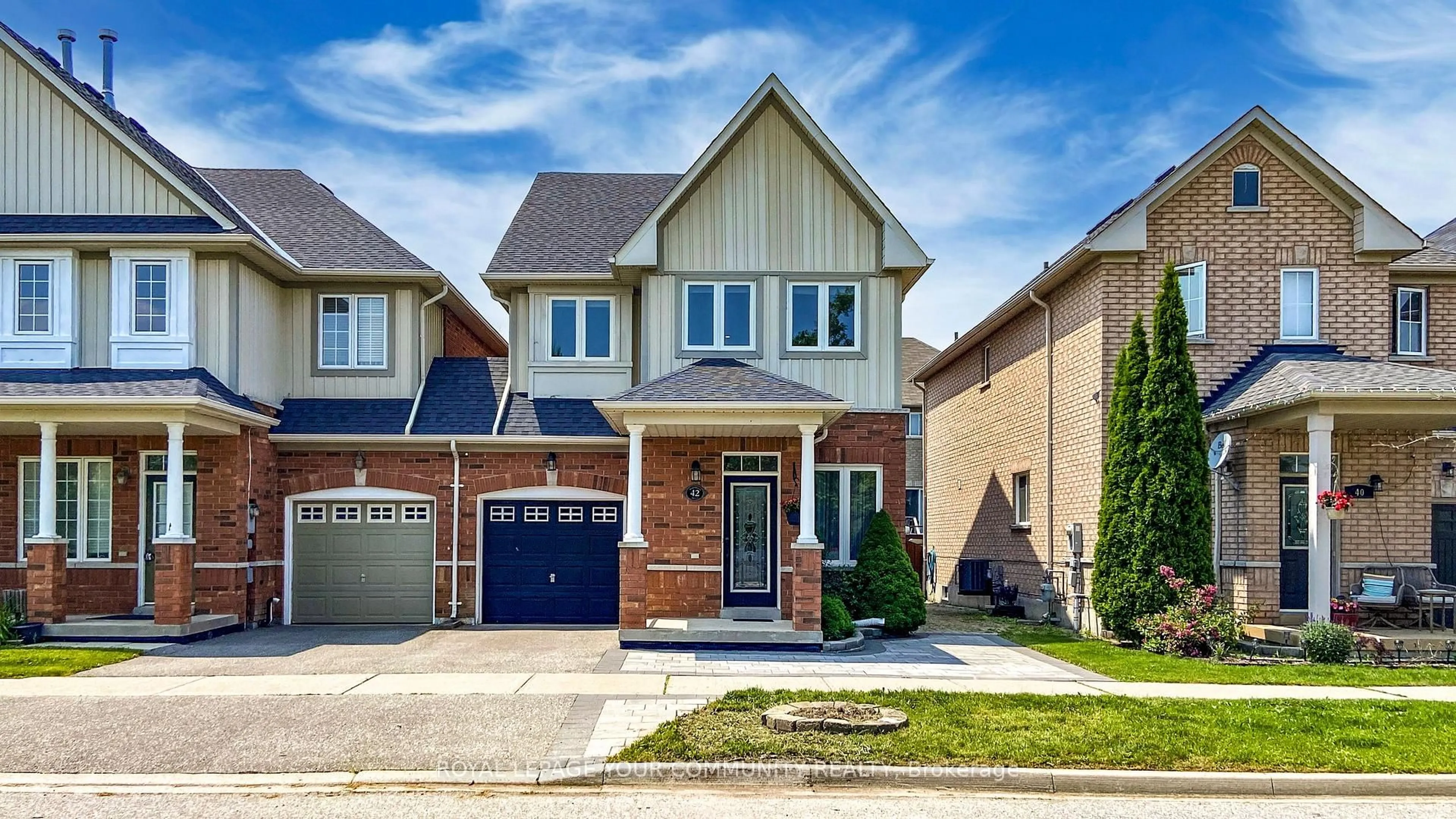 Home with brick exterior material, street for 42 Barnwood Dr, Richmond Hill Ontario L4E 5A3
