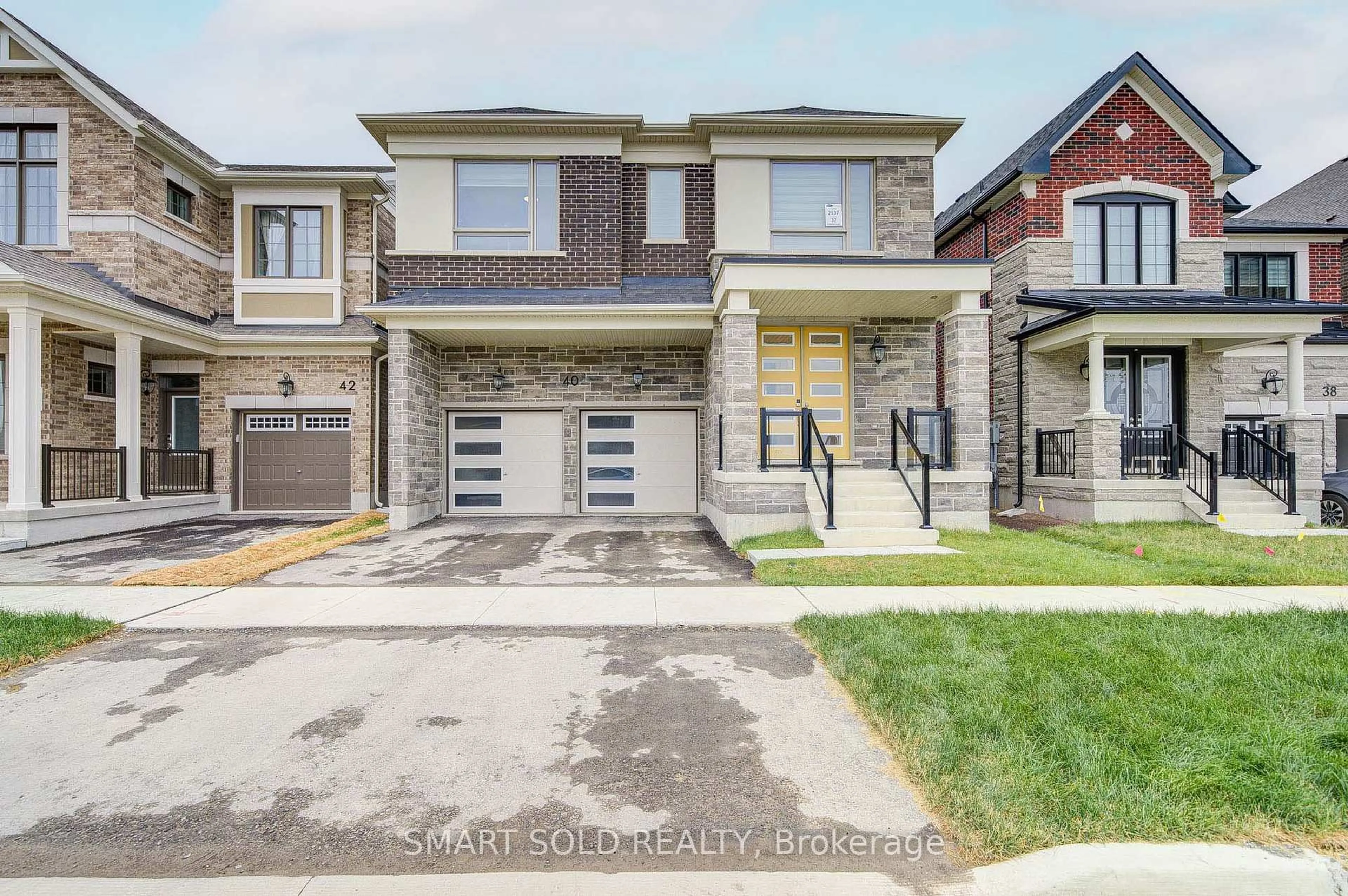 Home with brick exterior material, street for 40 Misthollow Cres, Markham Ontario L6C 3M5