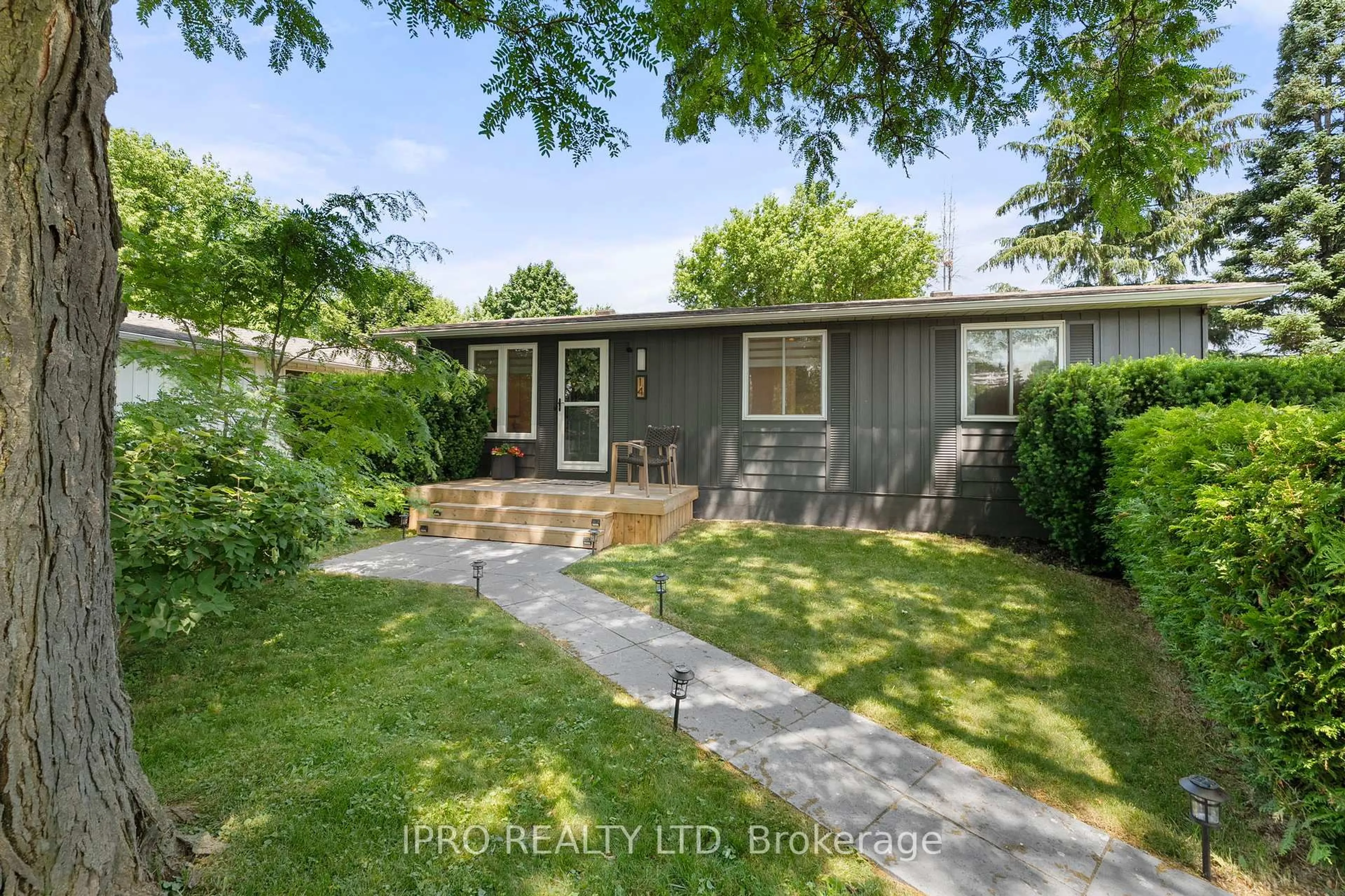 A pic from outside/outdoor area/front of a property/back of a property/a pic from drone, street for 14 Greenaway St, New Tecumseth Ontario L0G 1W0