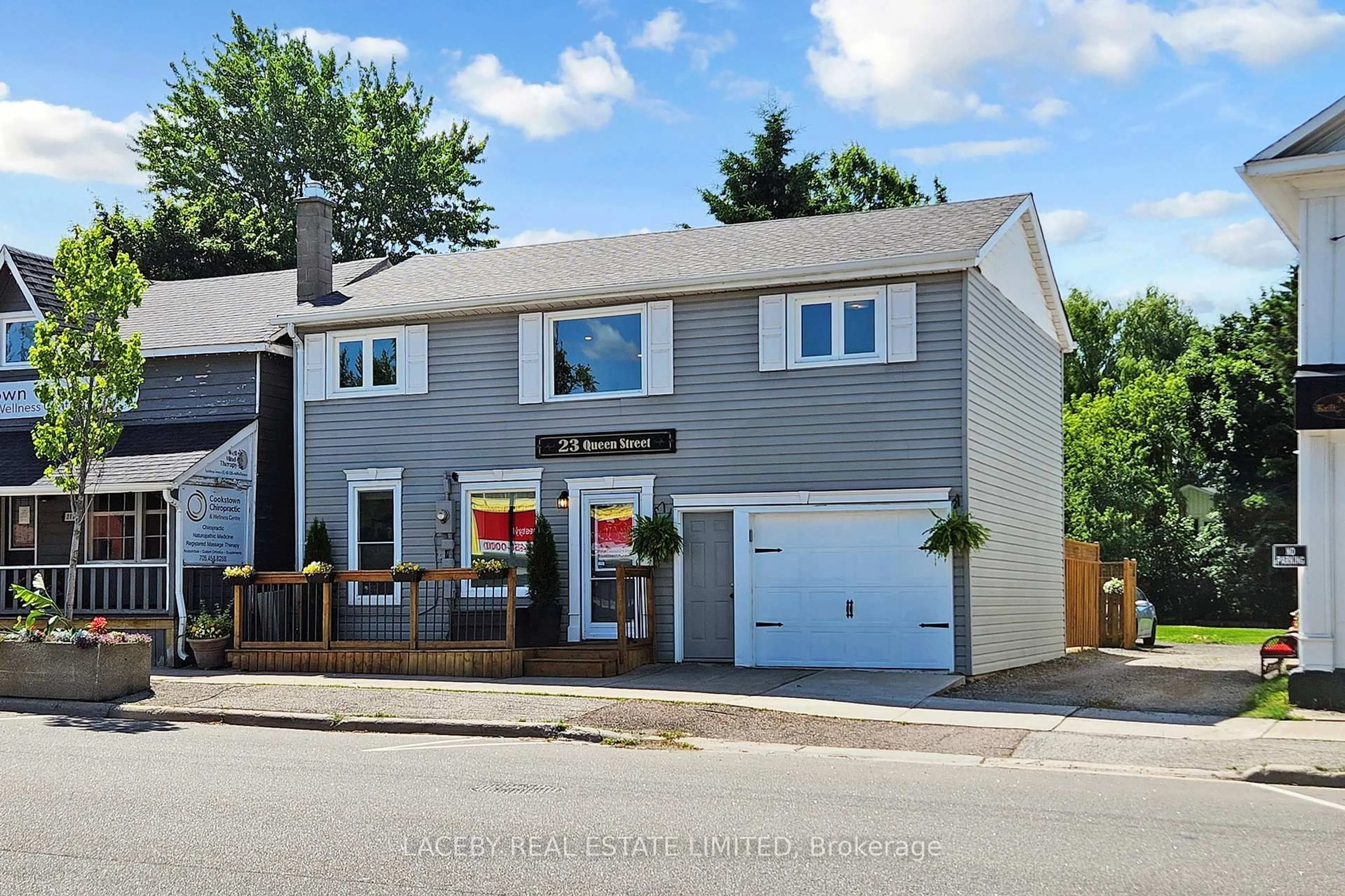 Home with vinyl exterior material, street for 23 Queen St, Innisfil Ontario L0L 1L0