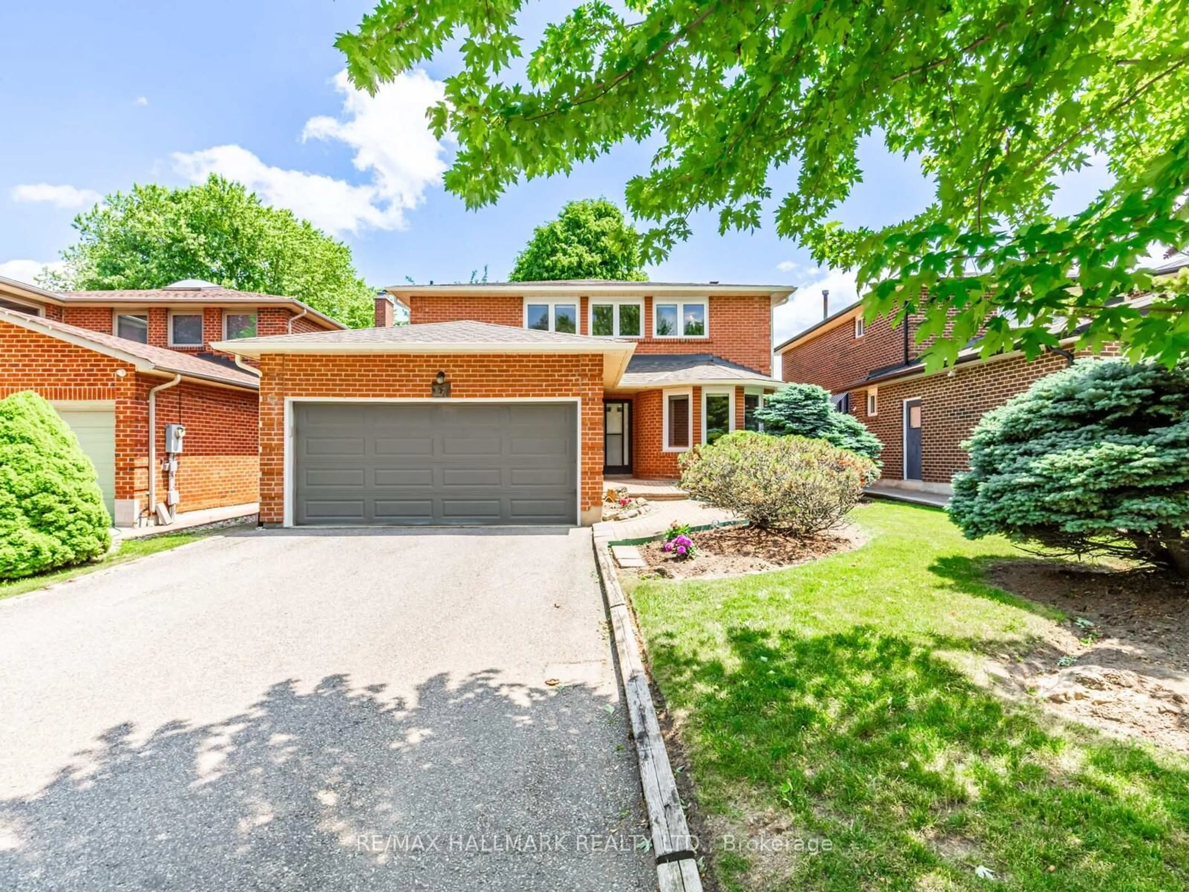 Home with brick exterior material, street for 17 Livingstone Rd, Markham Ontario L3T 7B9