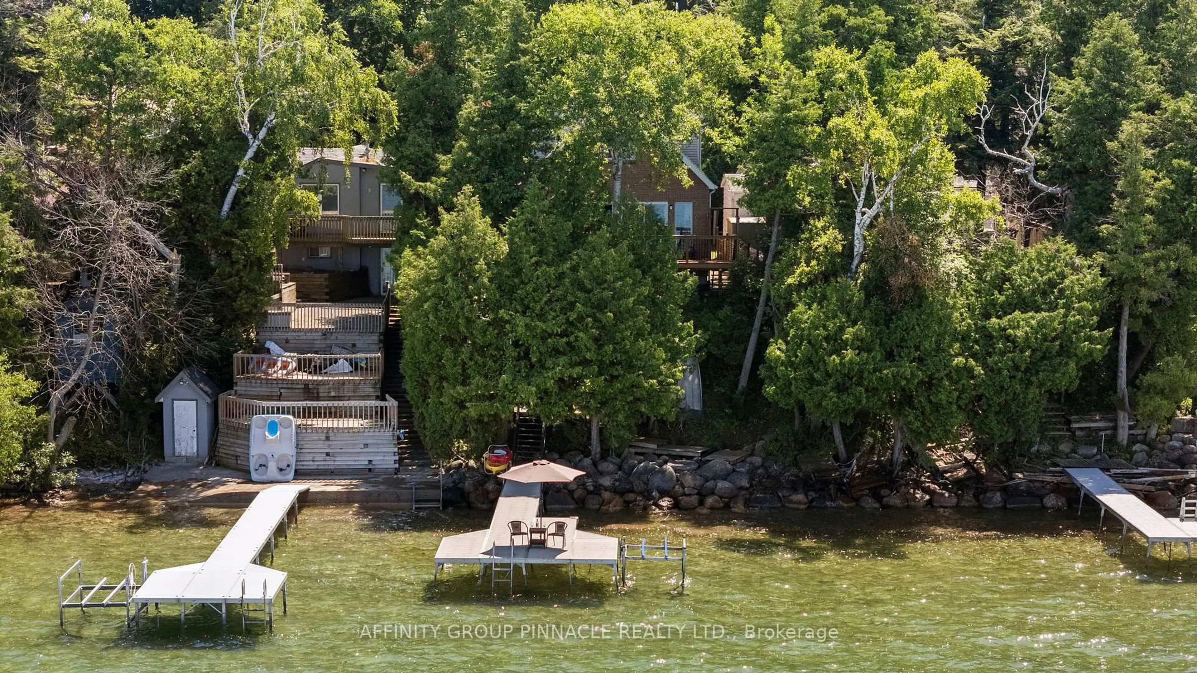 A pic from outside/outdoor area/front of a property/back of a property/a pic from drone, water/lake/river/ocean view for 24360 Thorah Park Blvd, Brock Ontario L0K 1A0