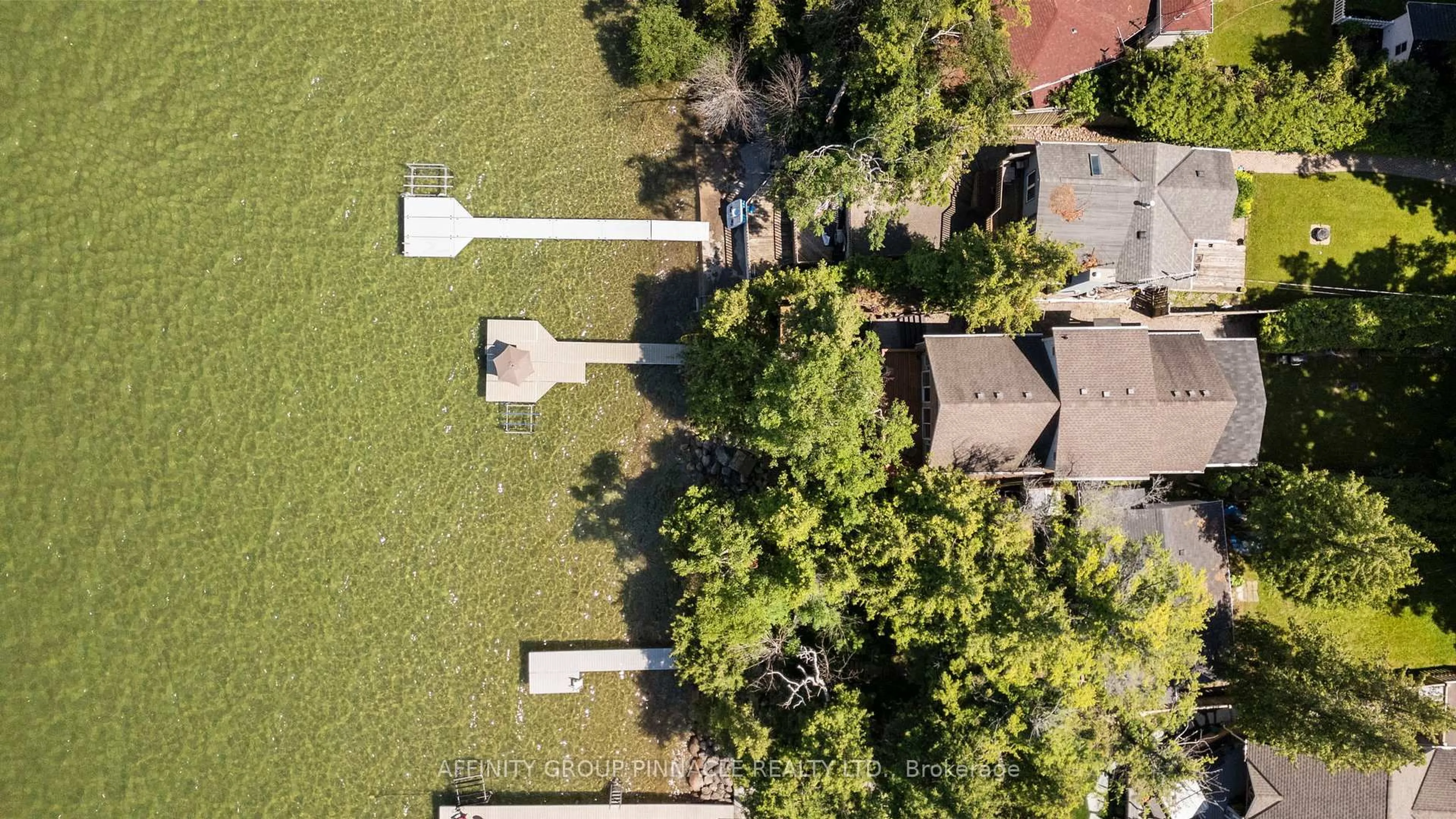A pic from outside/outdoor area/front of a property/back of a property/a pic from drone, street for 24360 Thorah Park Blvd, Brock Ontario L0K 1A0