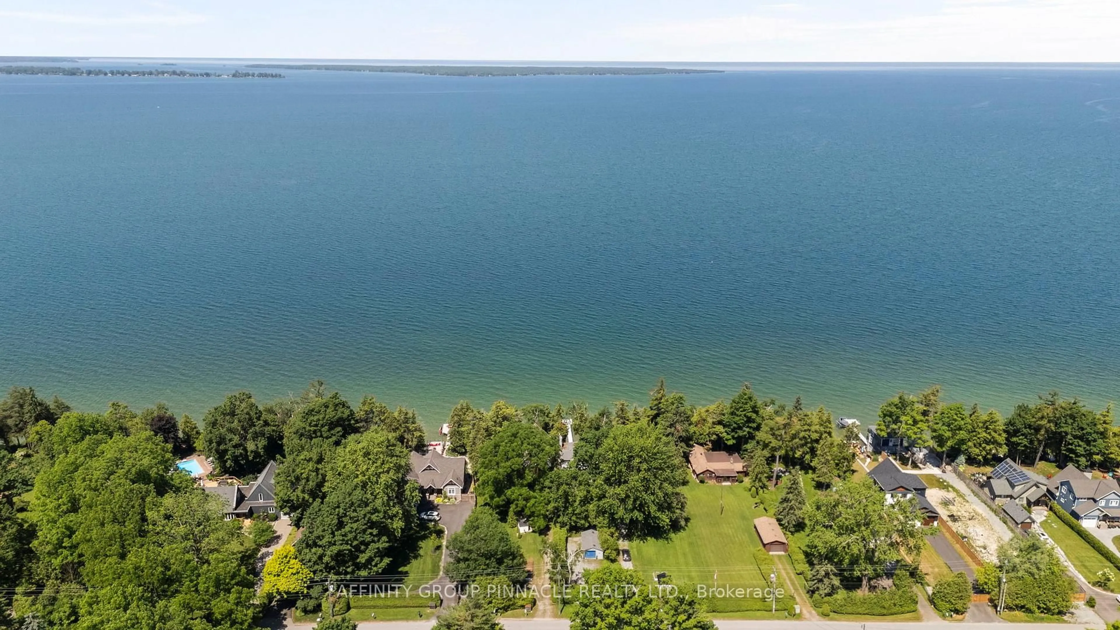 A pic from outside/outdoor area/front of a property/back of a property/a pic from drone, water/lake/river/ocean view for 24360 Thorah Park Blvd, Brock Ontario L0K 1A0