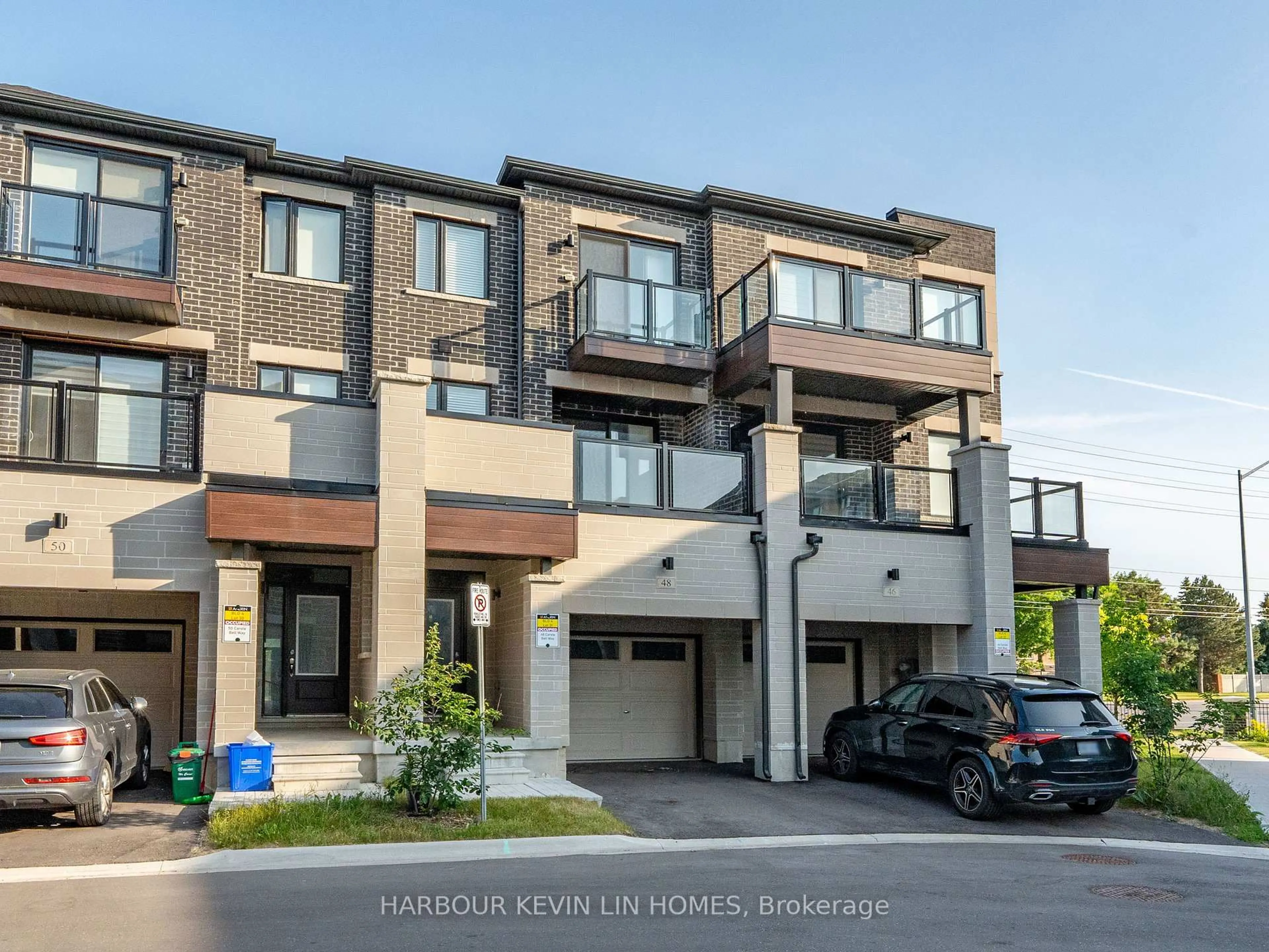 Home with brick exterior material, street for 48 Carole Bell Way, Markham Ontario L6E 0W2