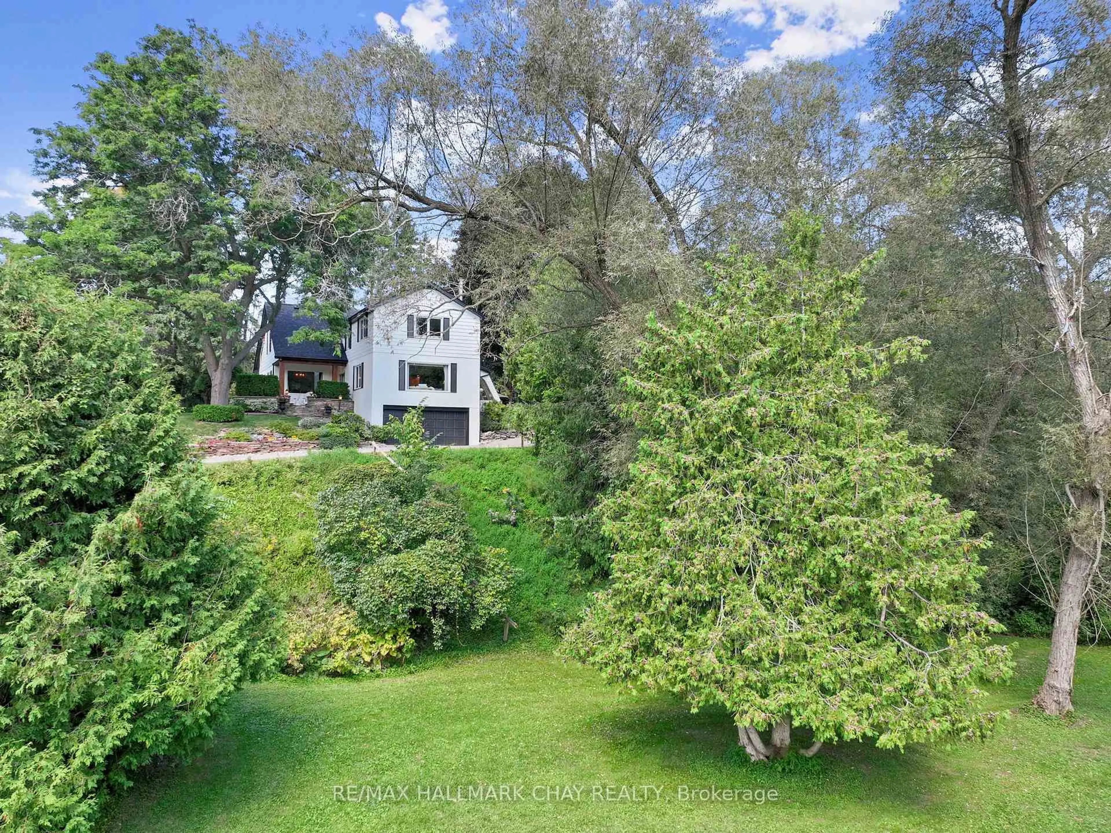 A pic from outside/outdoor area/front of a property/back of a property/a pic from drone, forest/trees view for 5053 Boyne St, New Tecumseth Ontario L9R 1V2