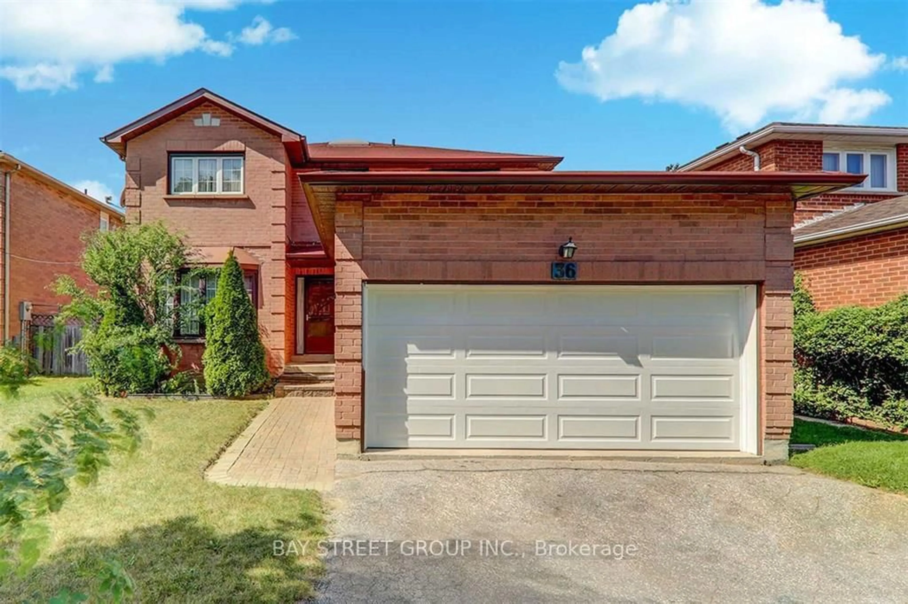 Home with brick exterior material, street for 36 NORMAN ROSS Dr, Markham Ontario L3S 3E8