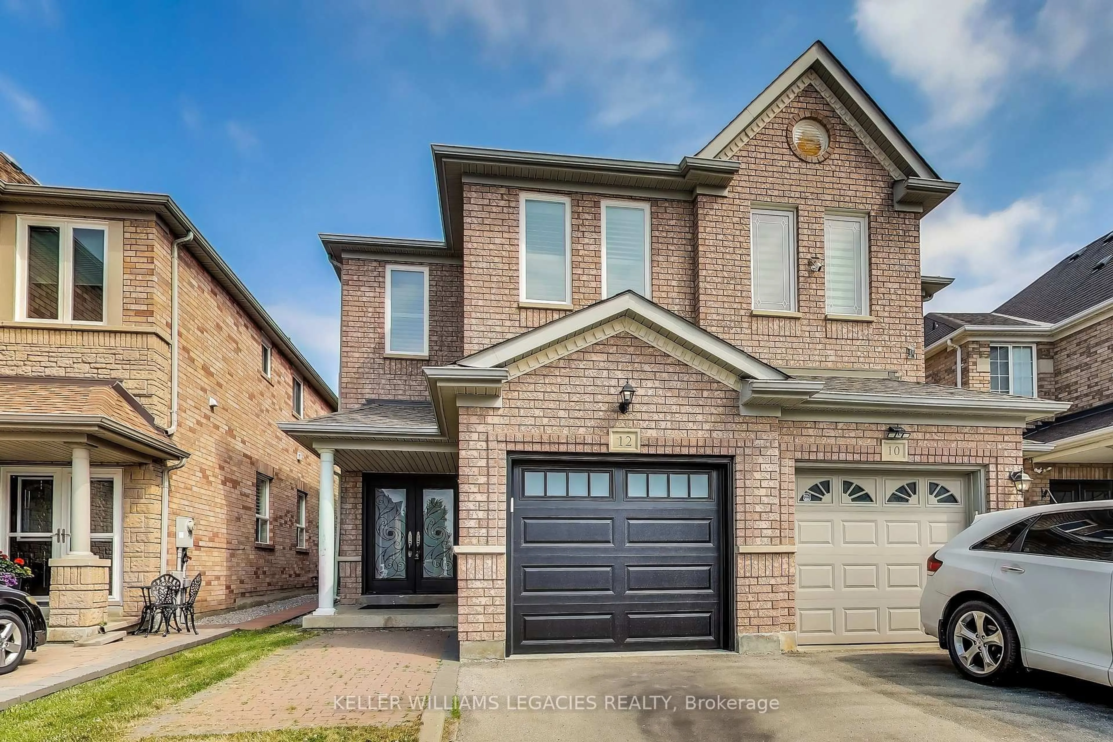Home with brick exterior material, street for 12 Tuscana Blvd, Vaughan Ontario L4K 5J2