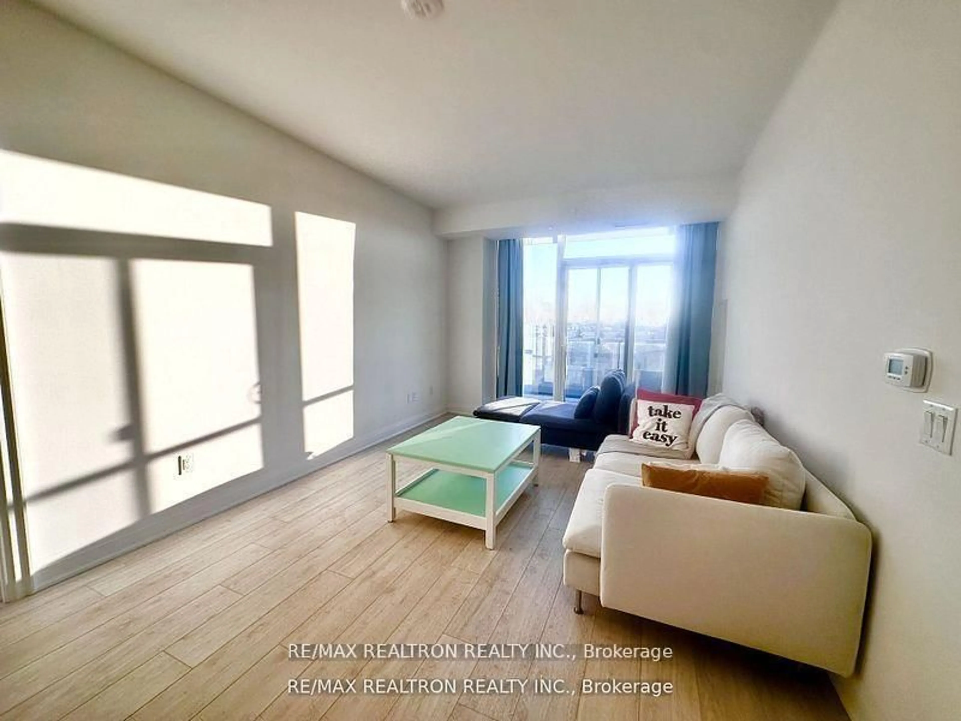Living room with furniture, wood/laminate floor for 10 Gatineau Dr #311W, Vaughan Ontario L4J 0L2