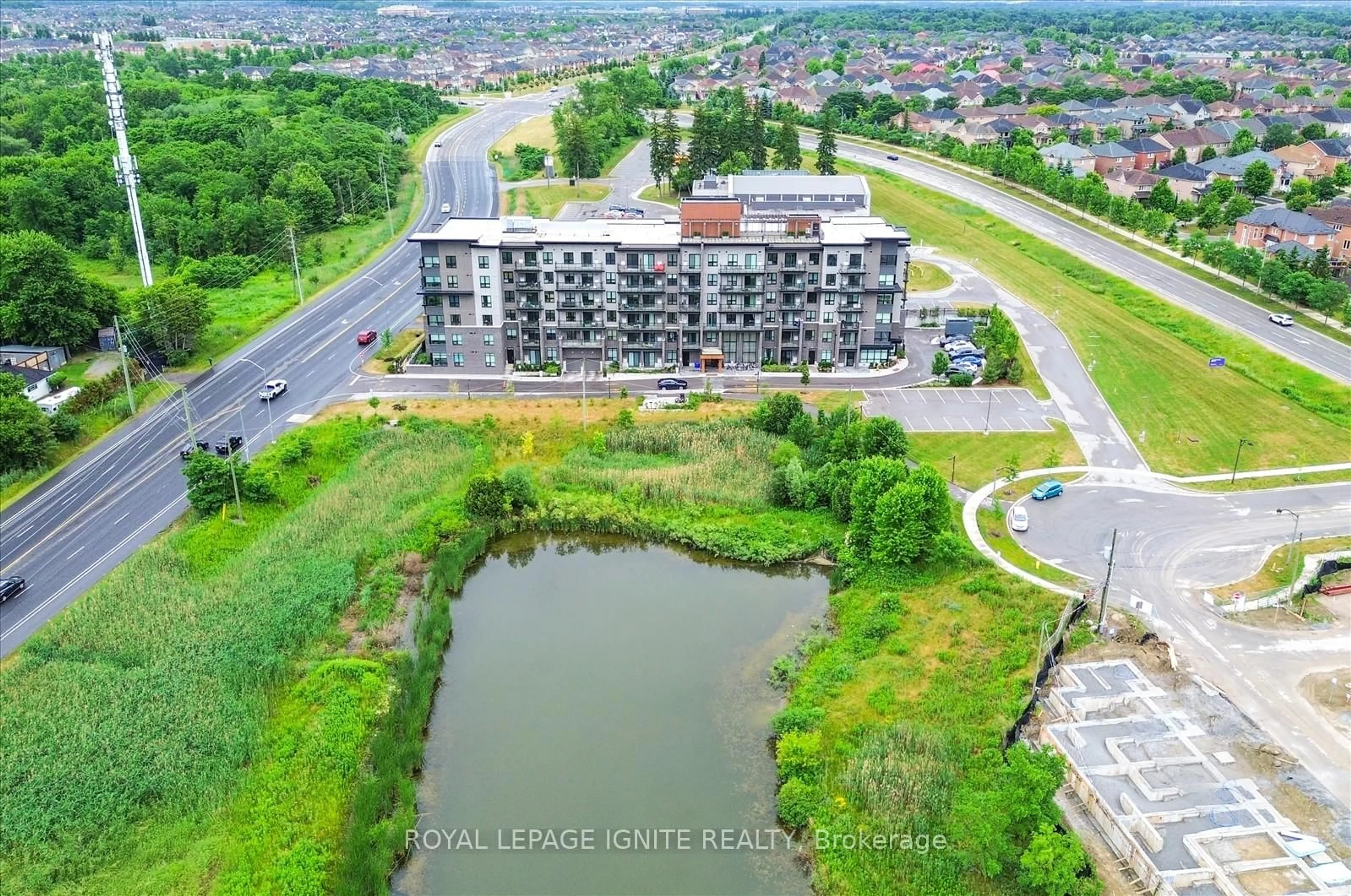 A pic from outside/outdoor area/front of a property/back of a property/a pic from drone, water/lake/river/ocean view for 9700 Ninth Line #719, Markham Ontario L6B 1R7