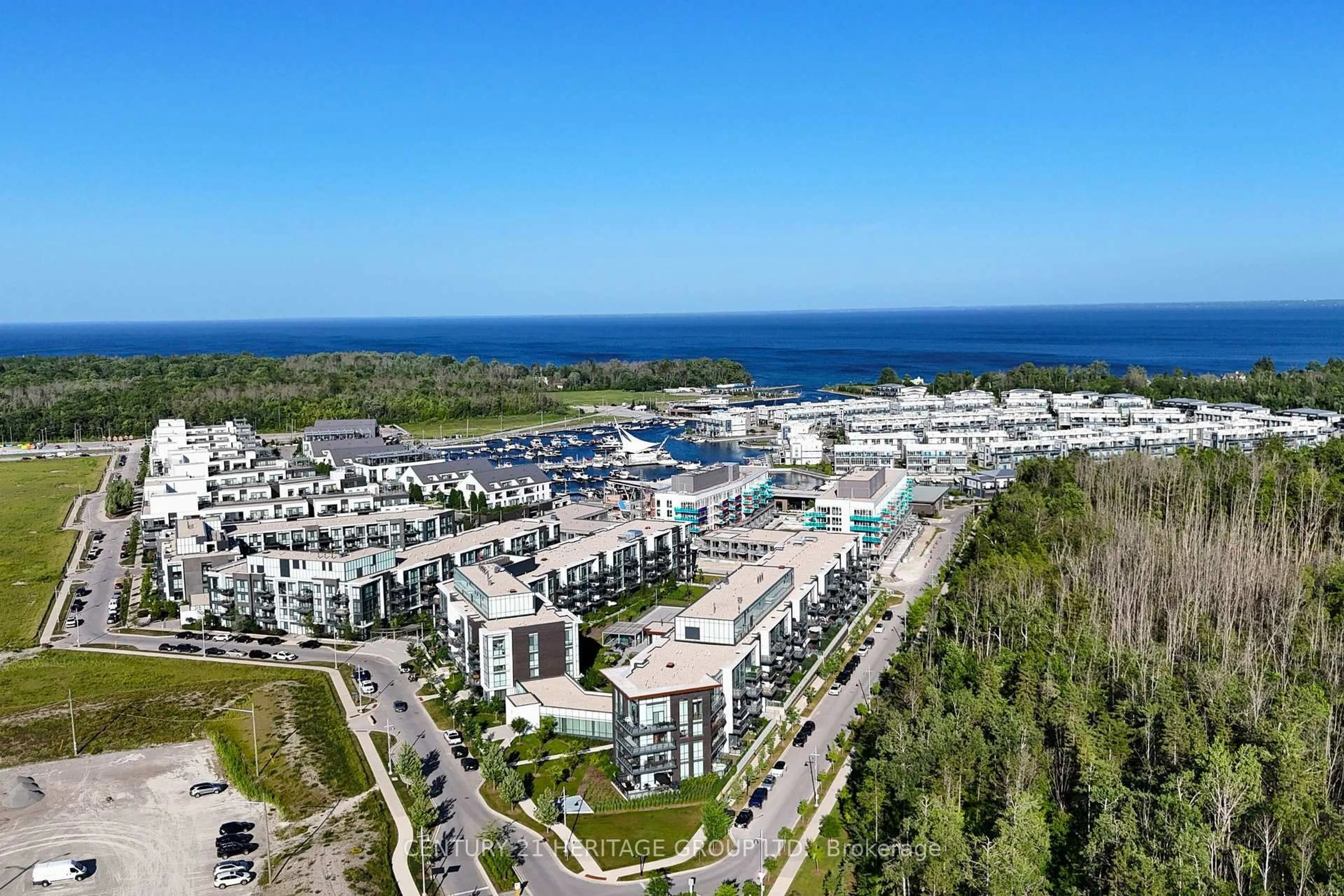 A pic from outside/outdoor area/front of a property/back of a property/a pic from drone, water/lake/river/ocean view for 375 Sea Ray Ave #225, Innisfil Ontario L9S 0L9