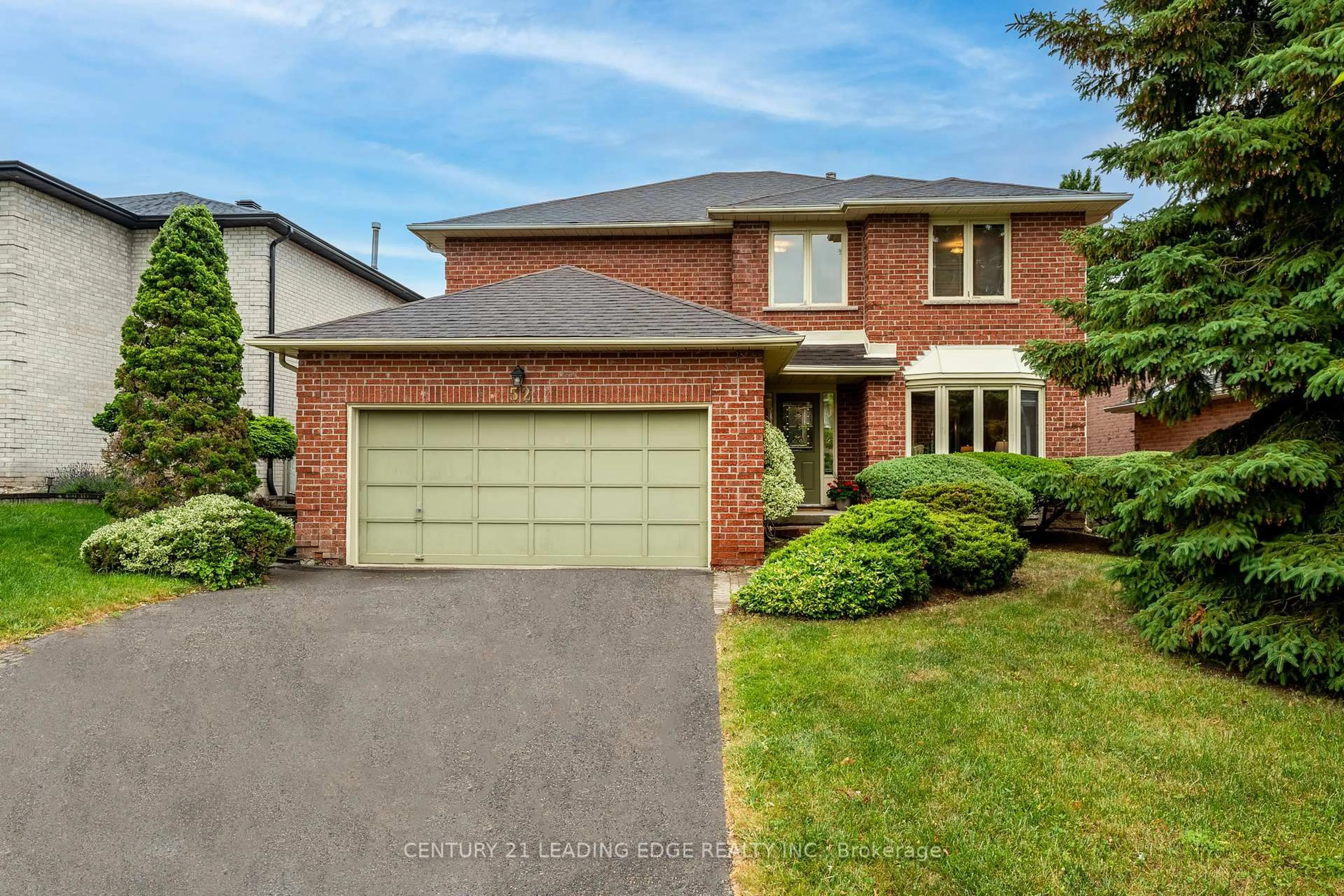 Home with brick exterior material, street for 52 Bryant Rd, Markham Ontario L3P 5Z2