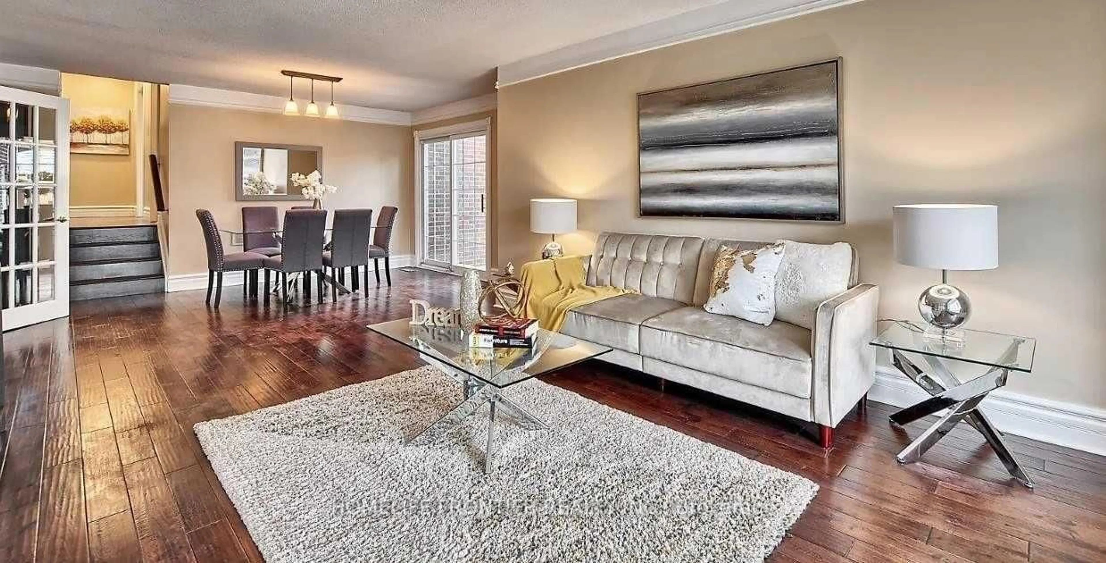 Living room with furniture, wood/laminate floor for 44 Rutledge Ave, Newmarket Ontario L3Y 5T4