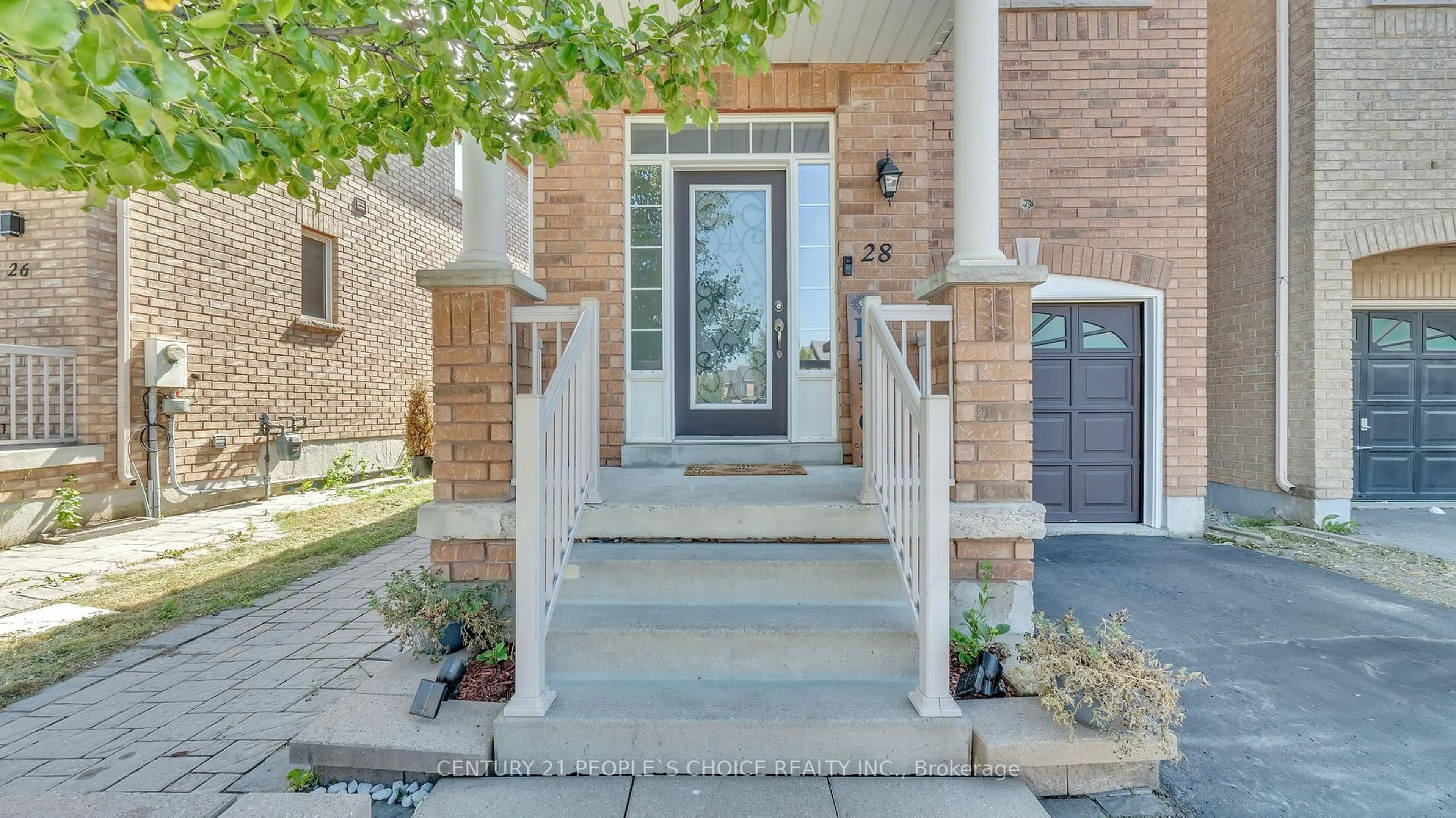 Home with brick exterior material, street for 28 Coleluke Lane, Markham Ontario L3S 0B7