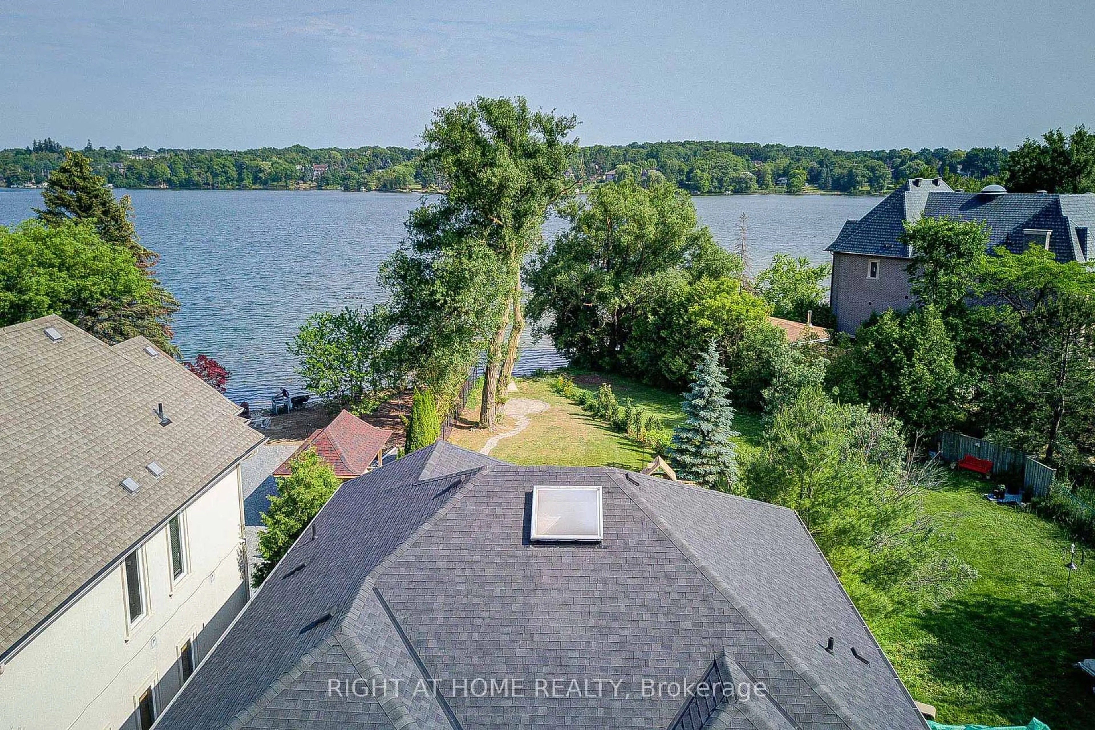 A pic from outside/outdoor area/front of a property/back of a property/a pic from drone, water/lake/river/ocean view for 429 North Lake Rd, Richmond Hill Ontario L4E 3A7