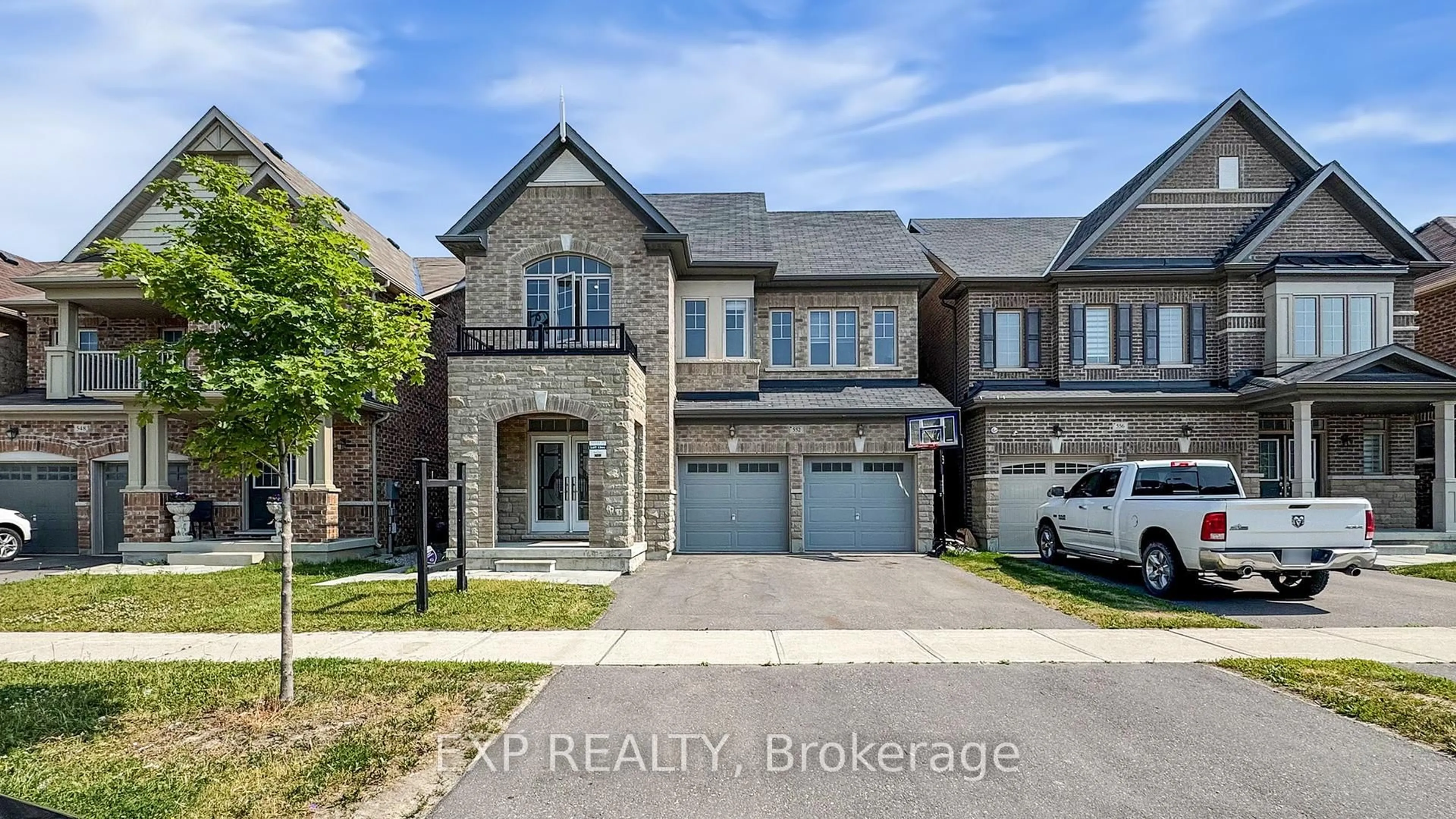 Home with brick exterior material, street for 552 Mactier Dr, Vaughan Ontario L4H 4L5