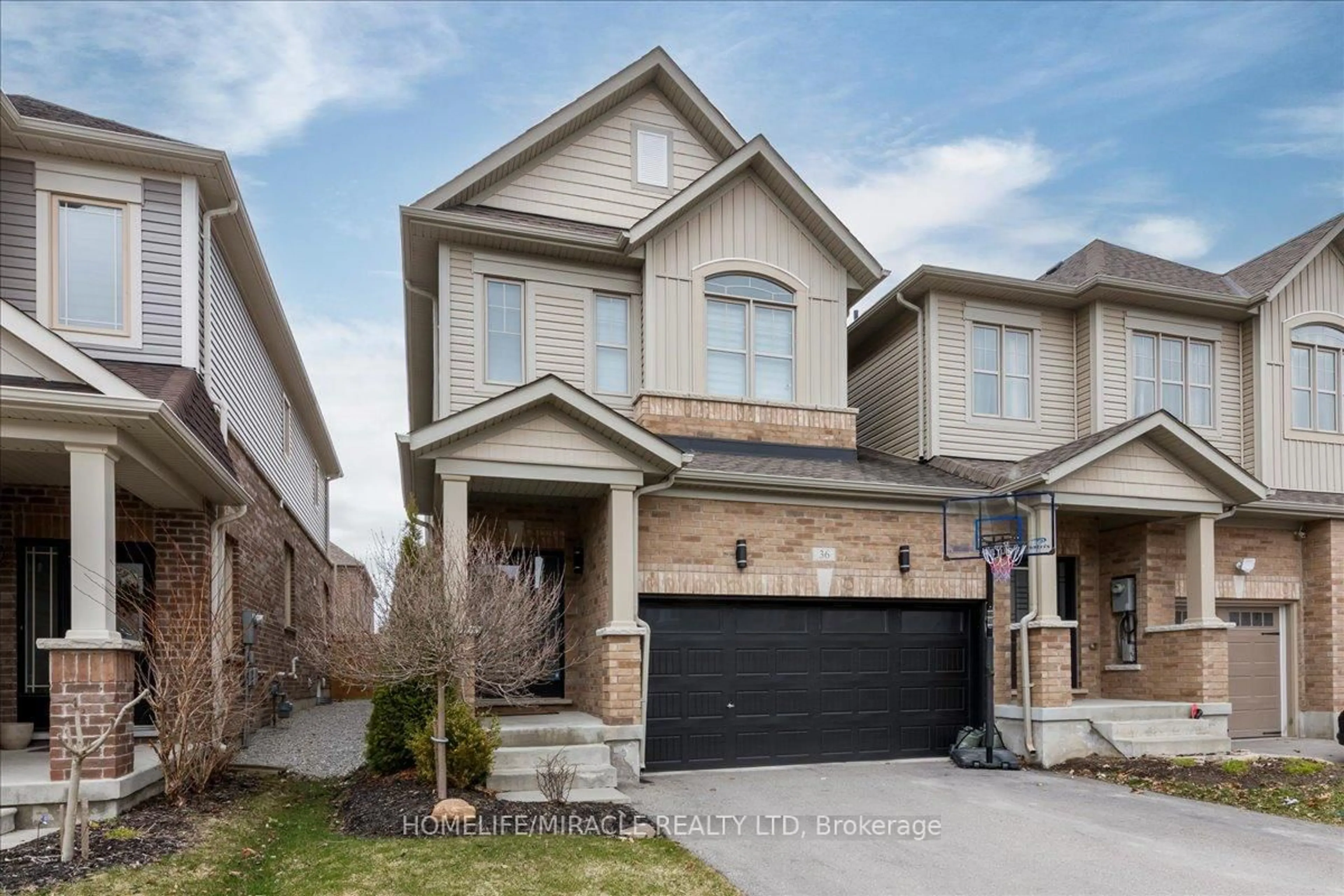 Home with brick exterior material, street for 36 Hoard Ave, New Tecumseth Ontario L9R 0M3