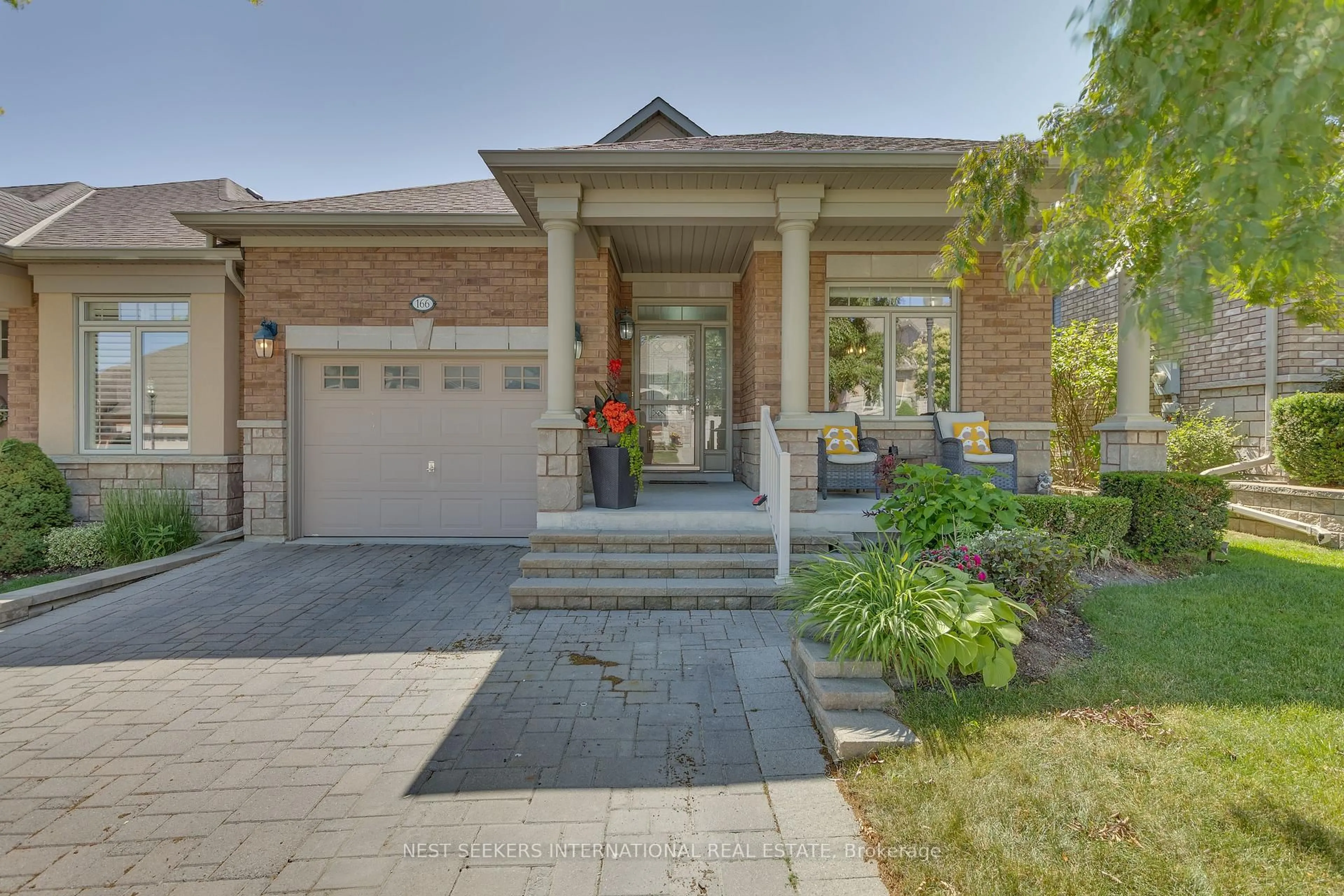 Home with brick exterior material, street for 166 Ridge Way, New Tecumseth Ontario L9R 0H3