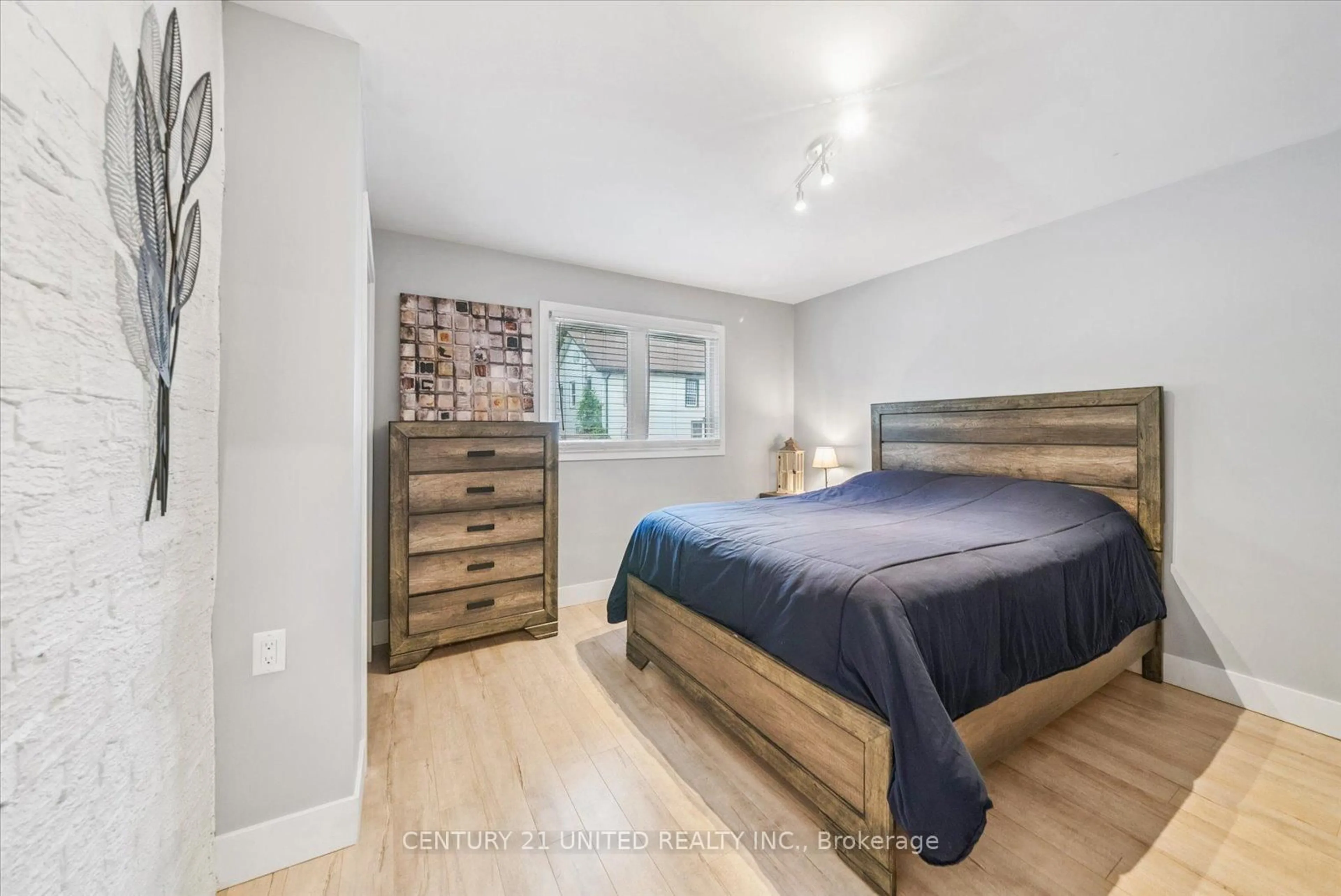 Bedroom with bed, wood/laminate floor for 5 Church St, Brock Ontario L0C 1H0