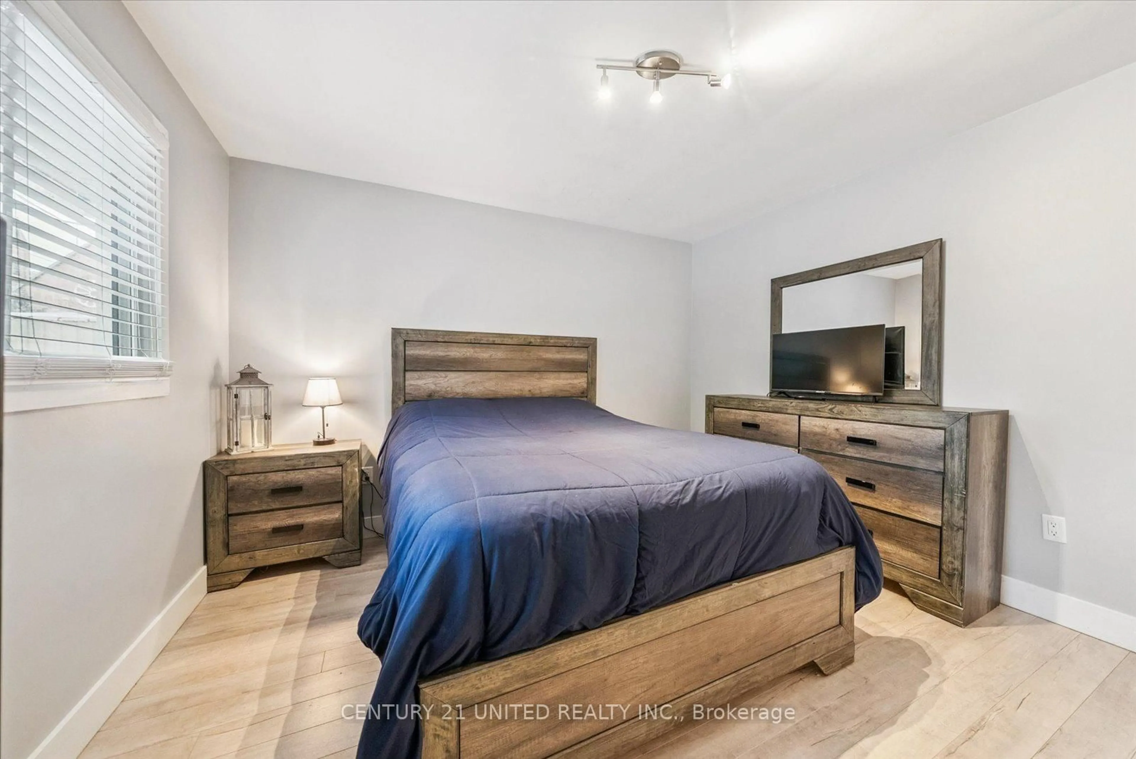 Bedroom with bed, wood/laminate floor for 5 Church St, Brock Ontario L0C 1H0