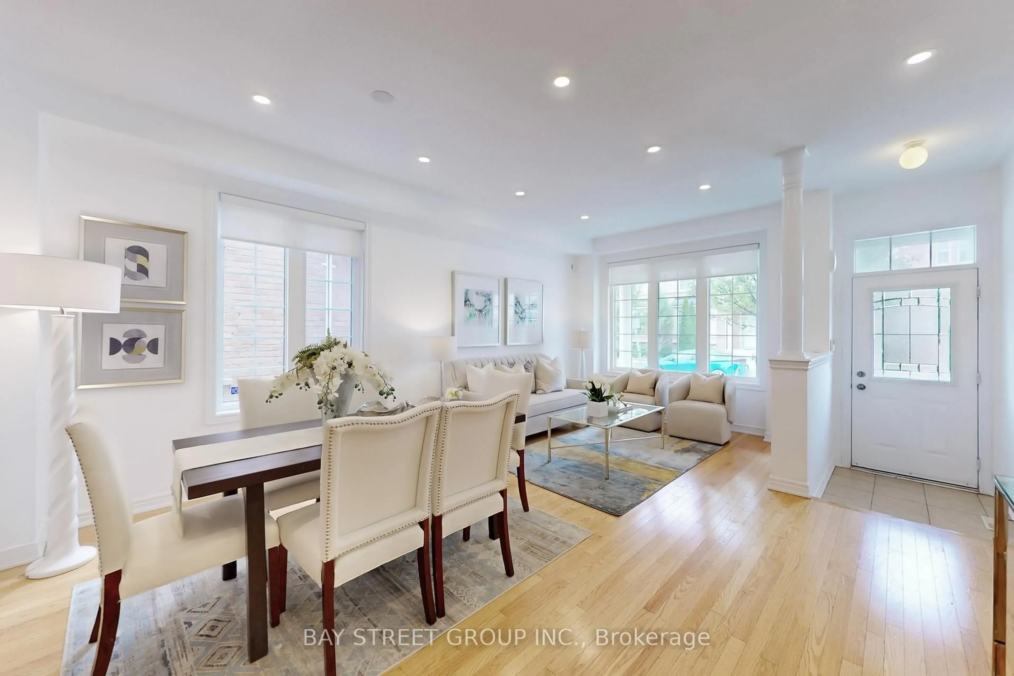 Living room with furniture, wood/laminate floor for 7 Tufo Ave, Markham Ontario L6C 0H8