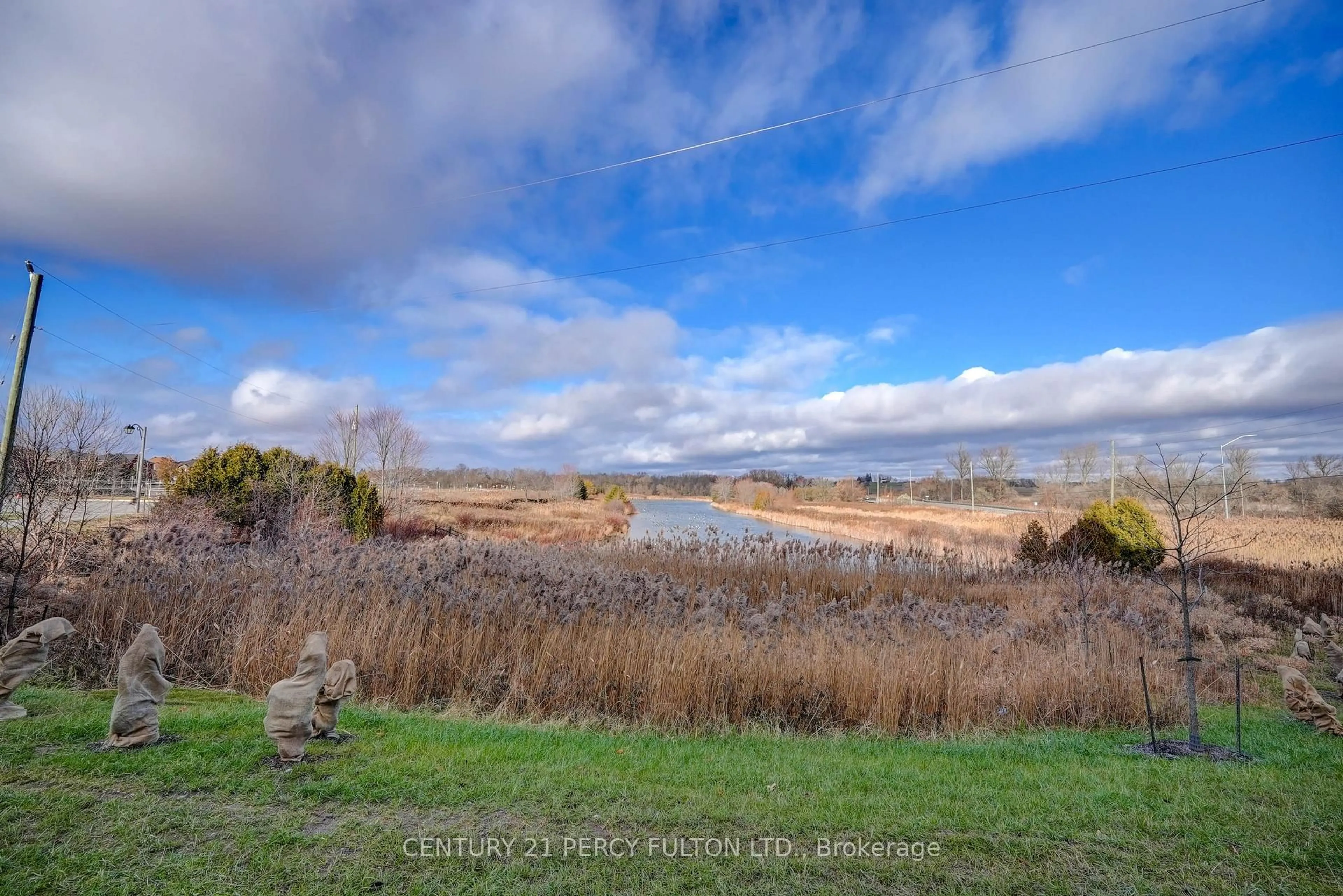 A pic from outside/outdoor area/front of a property/back of a property/a pic from drone, water/lake/river/ocean view for 9700 Ninth Line #217, Markham Ontario L6B 1R7