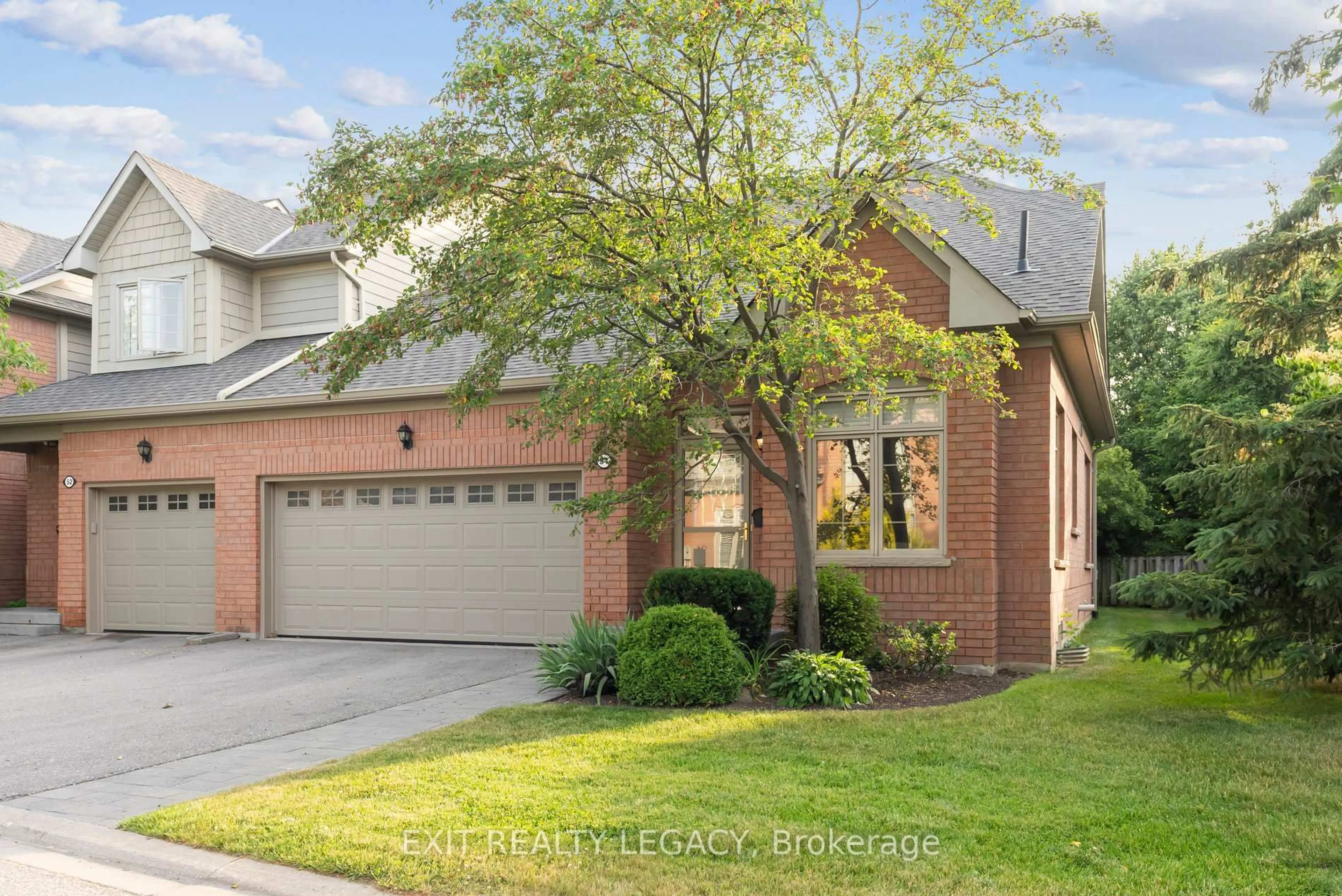 Home with brick exterior material, street for 54 Louisbourg Way, Markham Ontario L6E 2A2