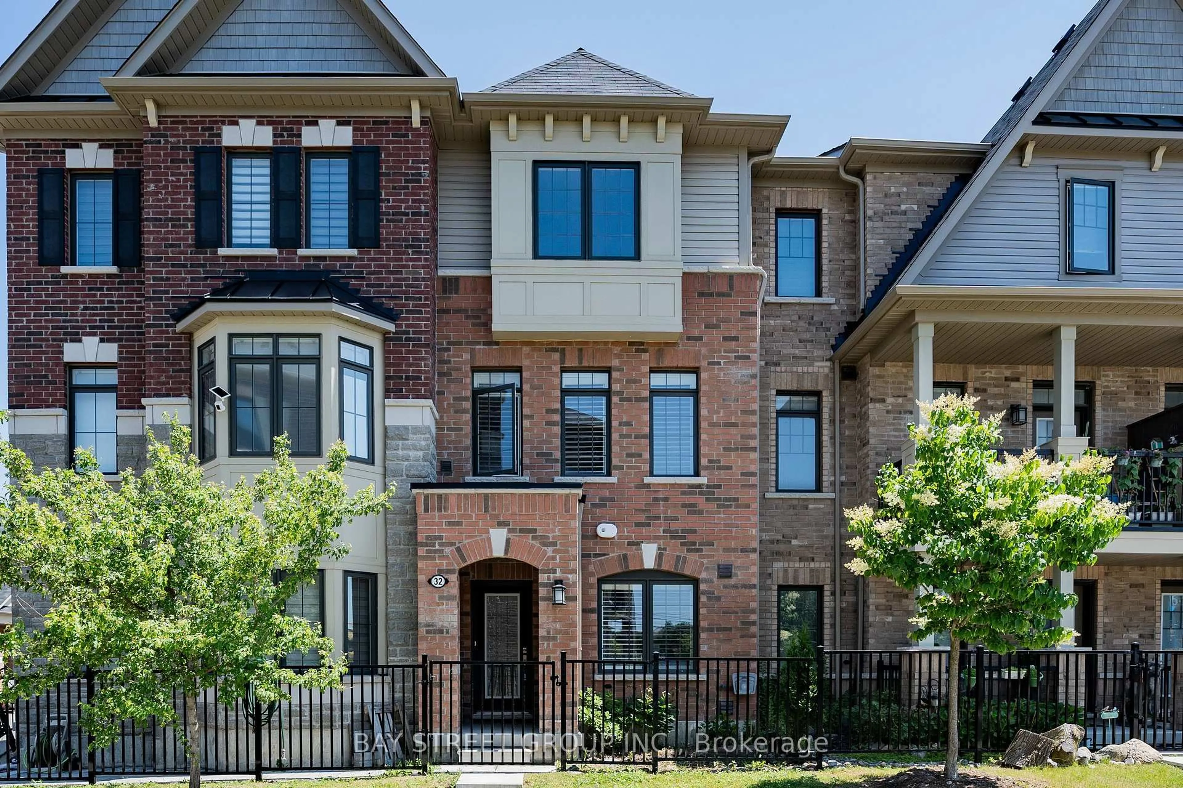Home with brick exterior material, street for 32 Cafaro Lane, Markham Ontario L6C 0Z2