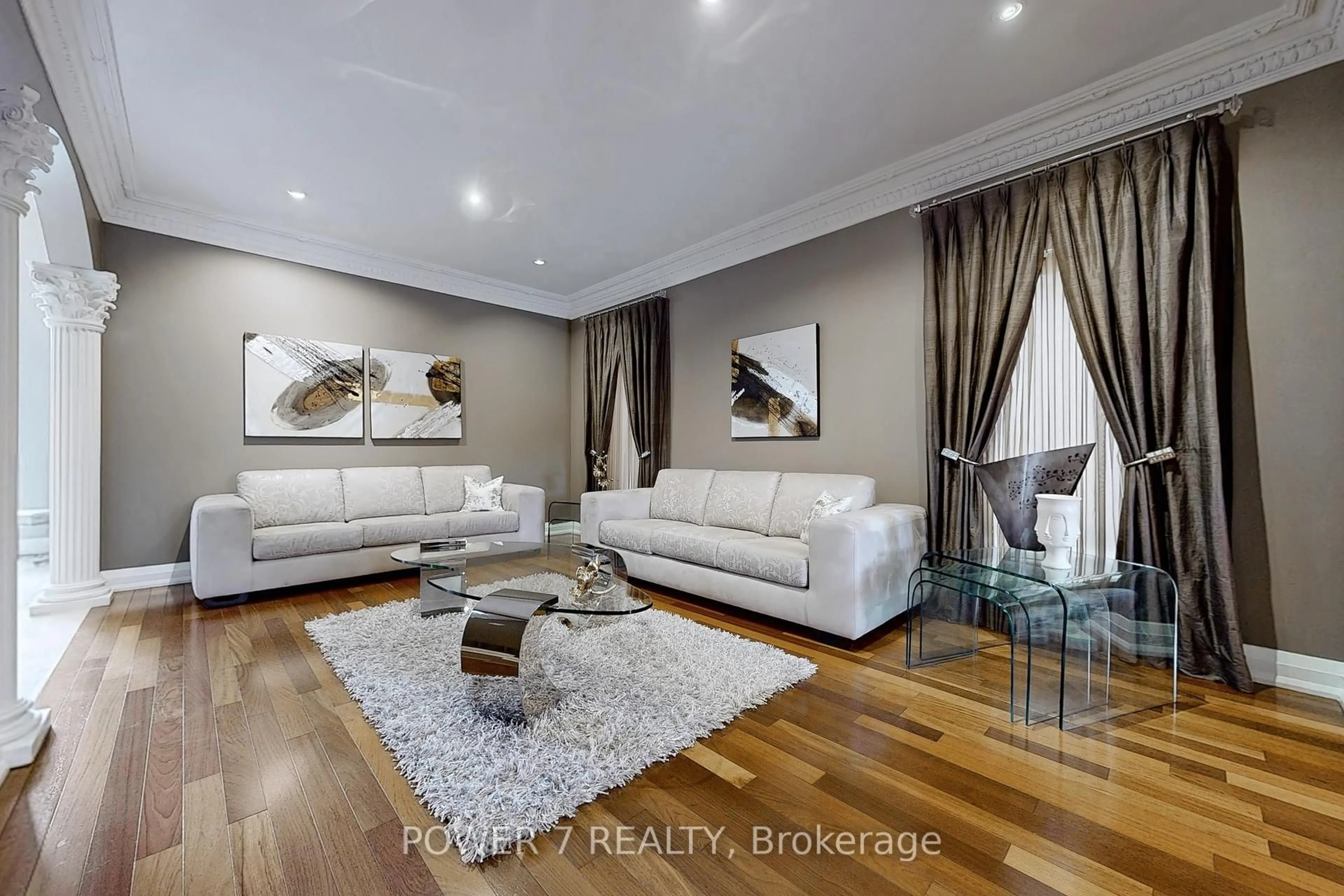 Living room with furniture, wood/laminate floor for 76 Silver Rose Cres, Markham Ontario L6C 1W6