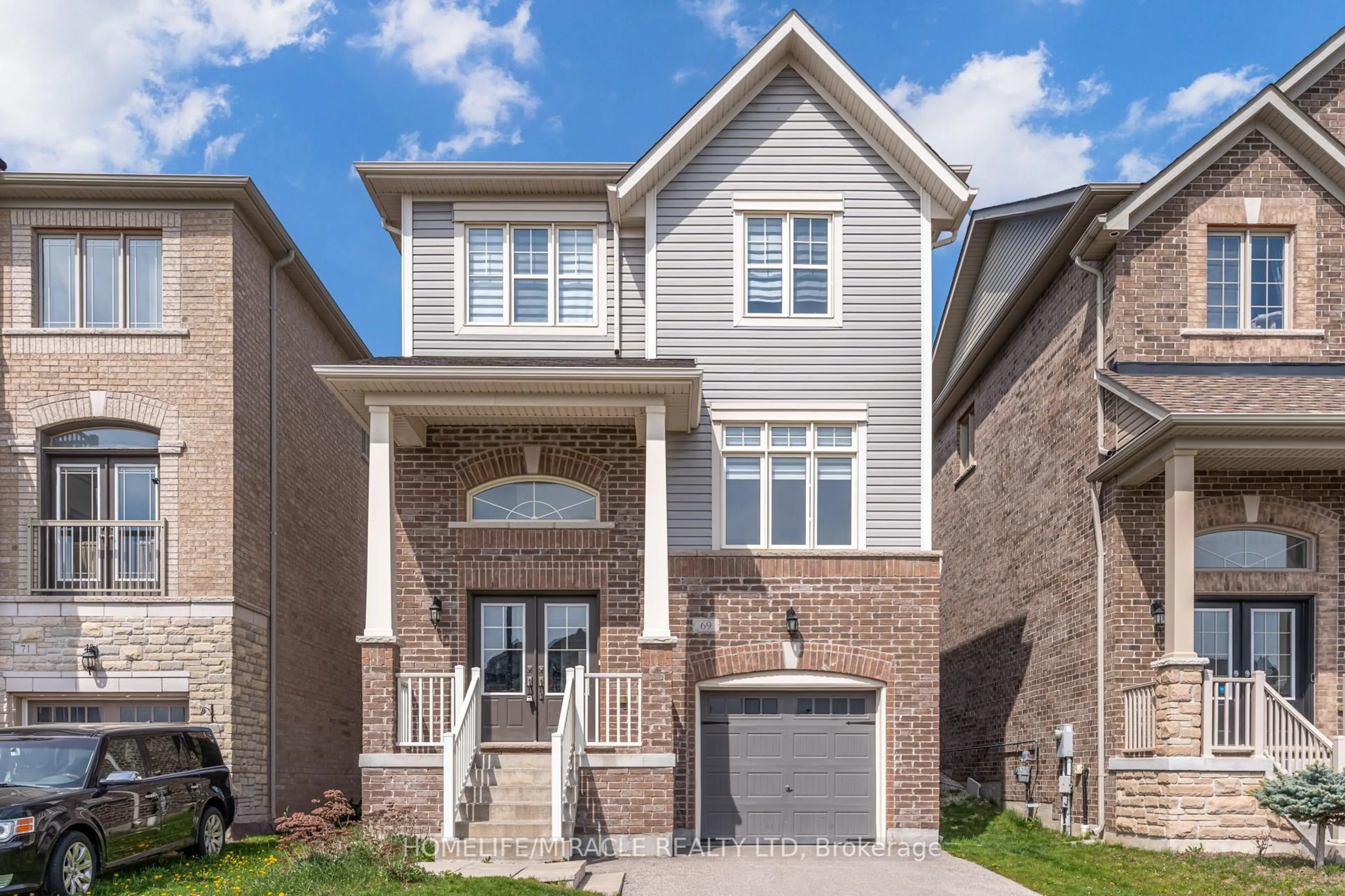 Home with brick exterior material, street for 69 Sutcliffe Way, New Tecumseth Ontario L9R 0N8