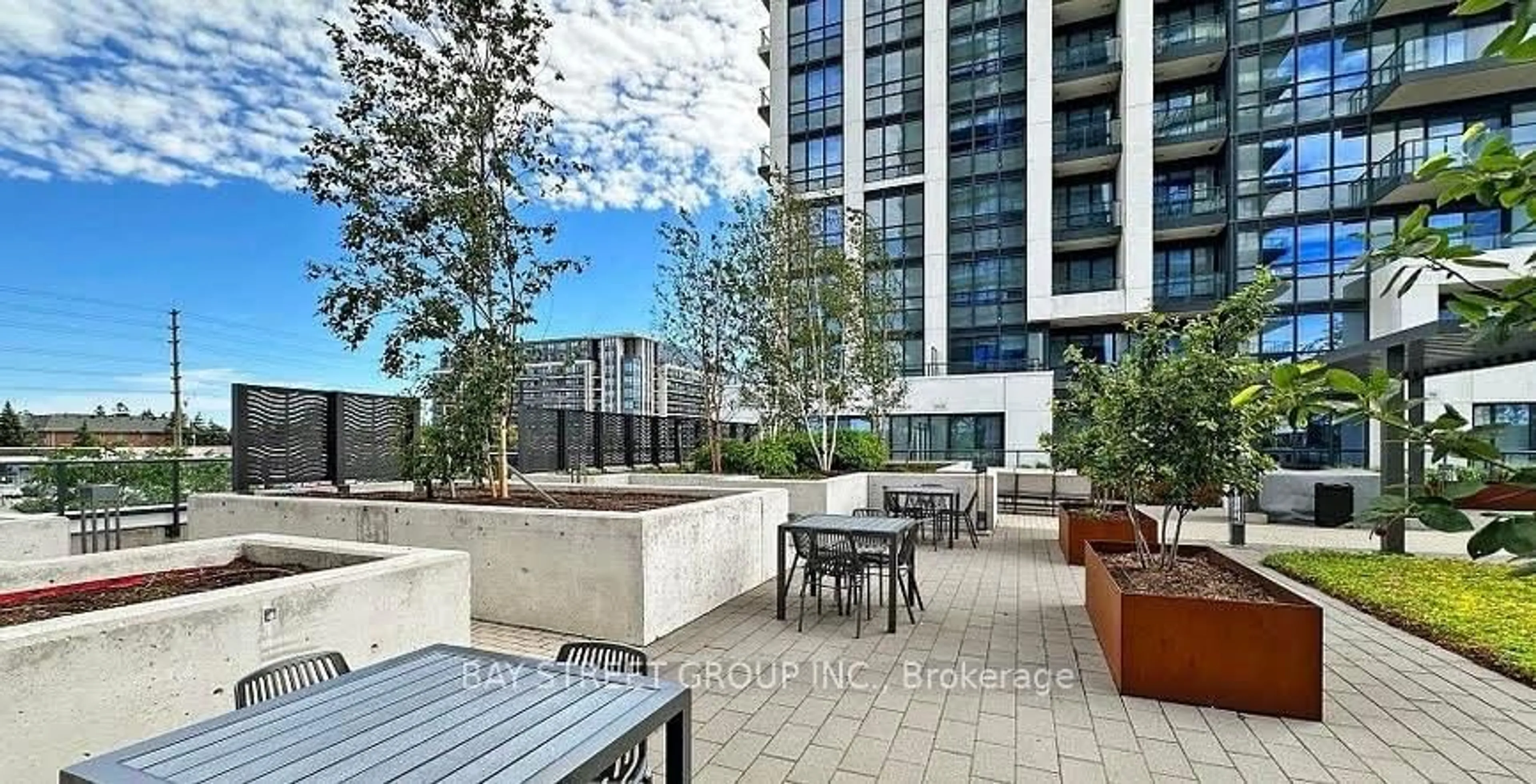 Patio, city buildings view from balcony for 38 Gandhi Lane #210, Markham Ontario L3T 0G9