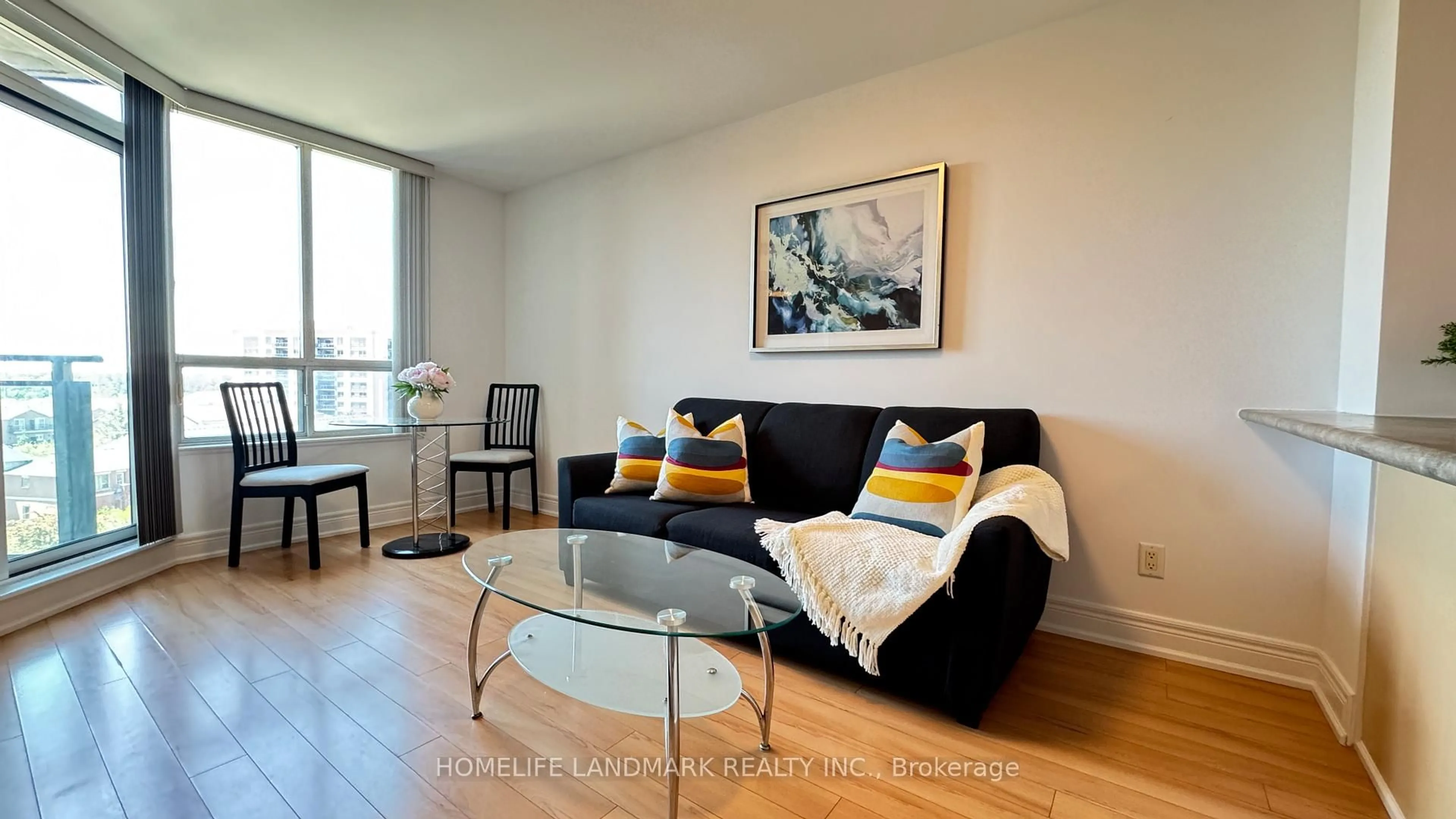 Living room with furniture, wood/laminate floor for 62 Suncrest Blvd #826, Markham Ontario L3T 7Y6